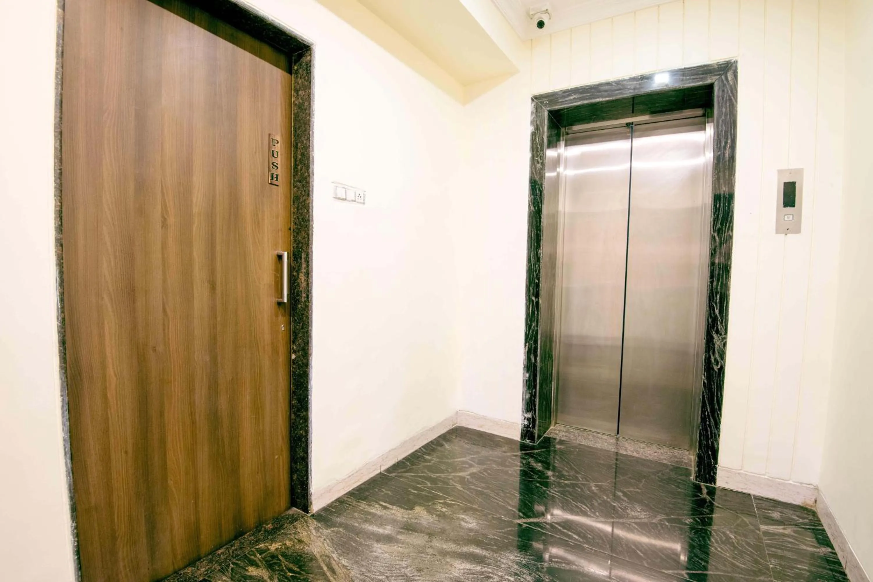 elevator in Treebo Reveniir Resort with Pool