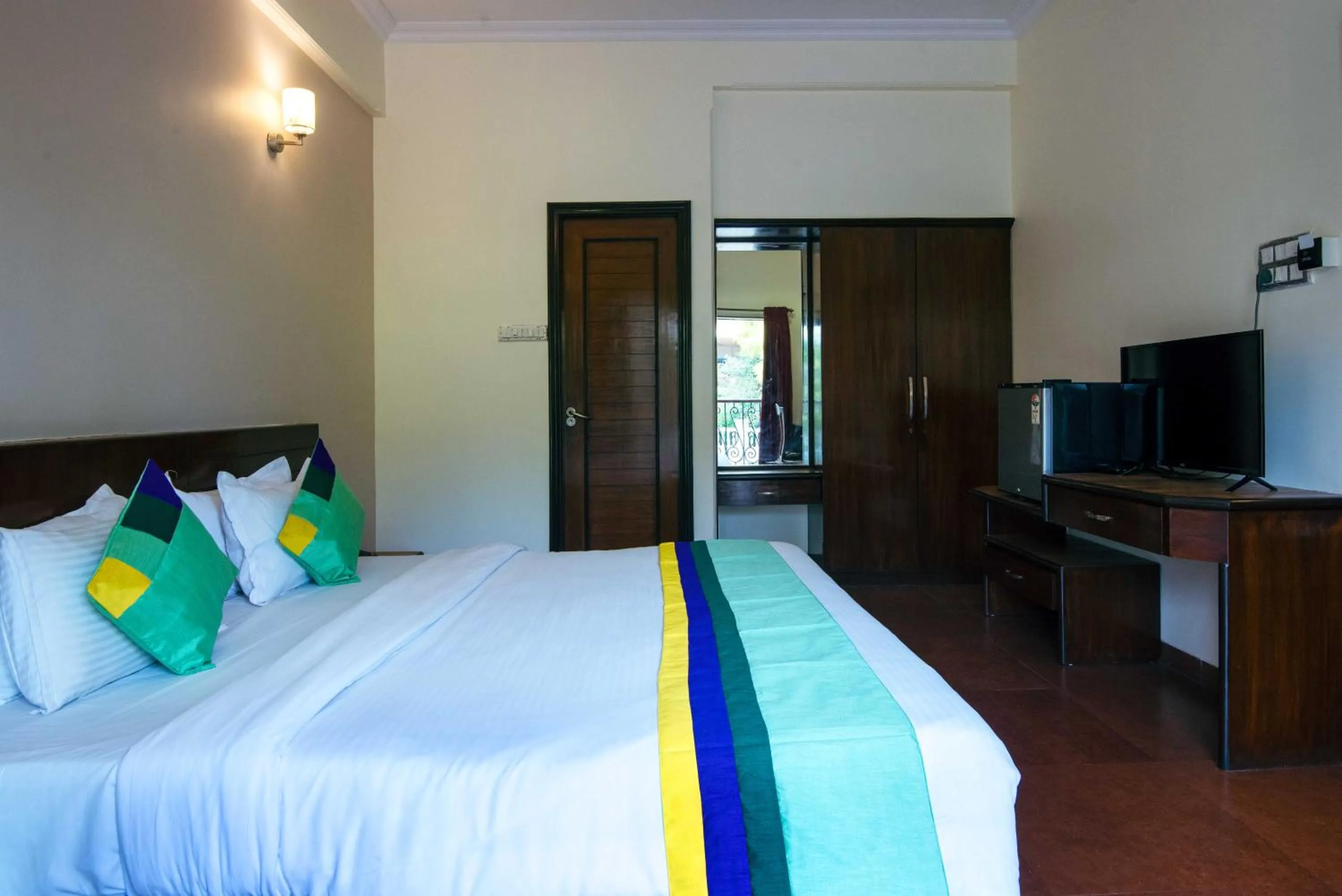 Bedroom, Bed in Treebo Reveniir Resort with Pool