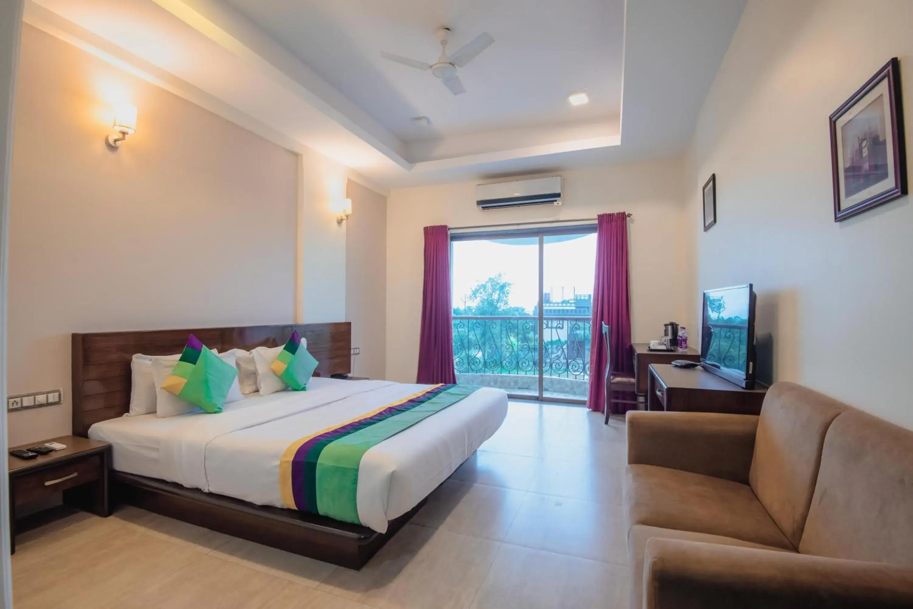 Deluxe Room with Balcony in Treebo Reveniir Resort with Pool Deluxe Room with Balcony in Treebo Reveniir Resort with Pool