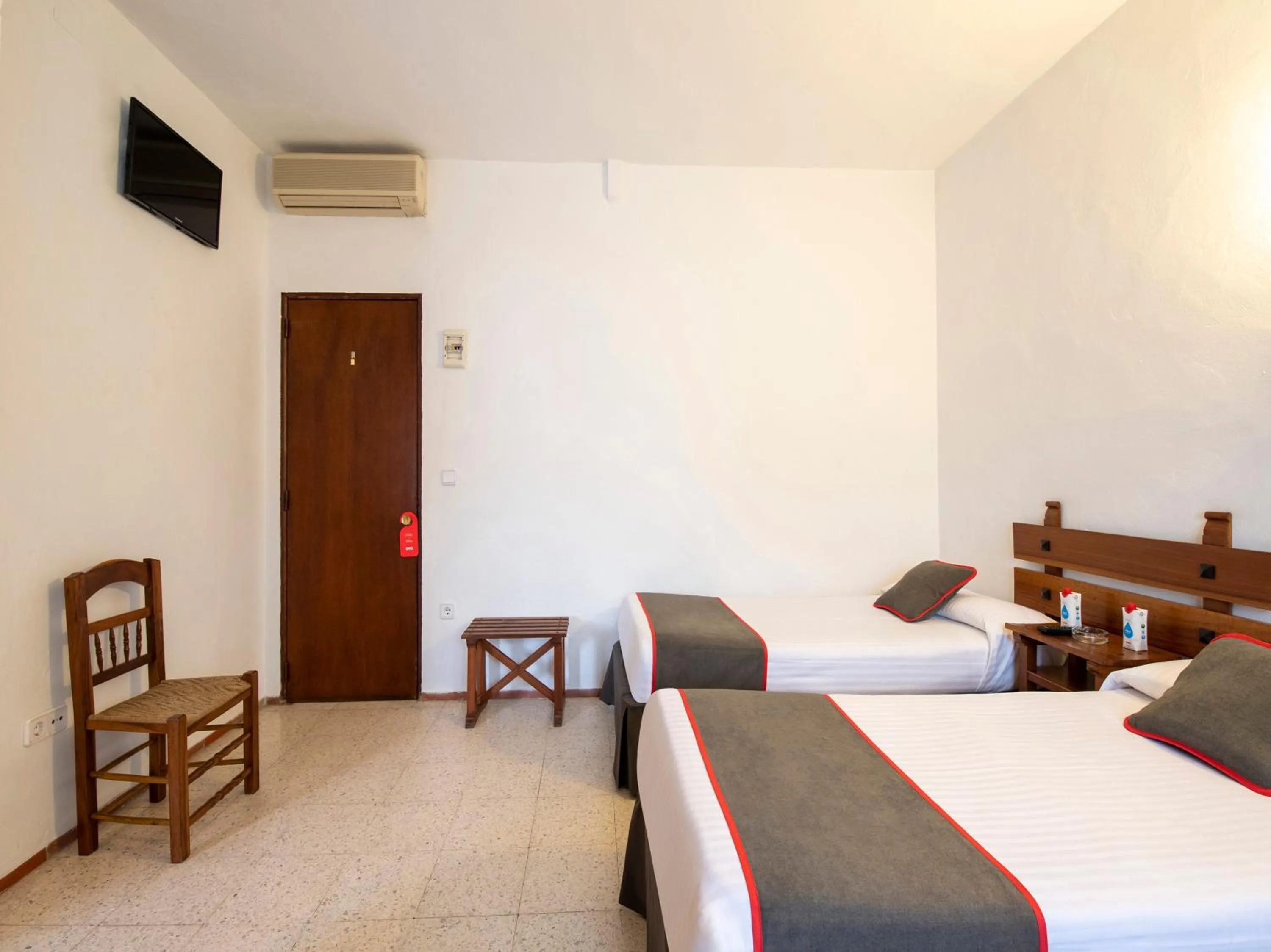 Bed in Hostal Santiago