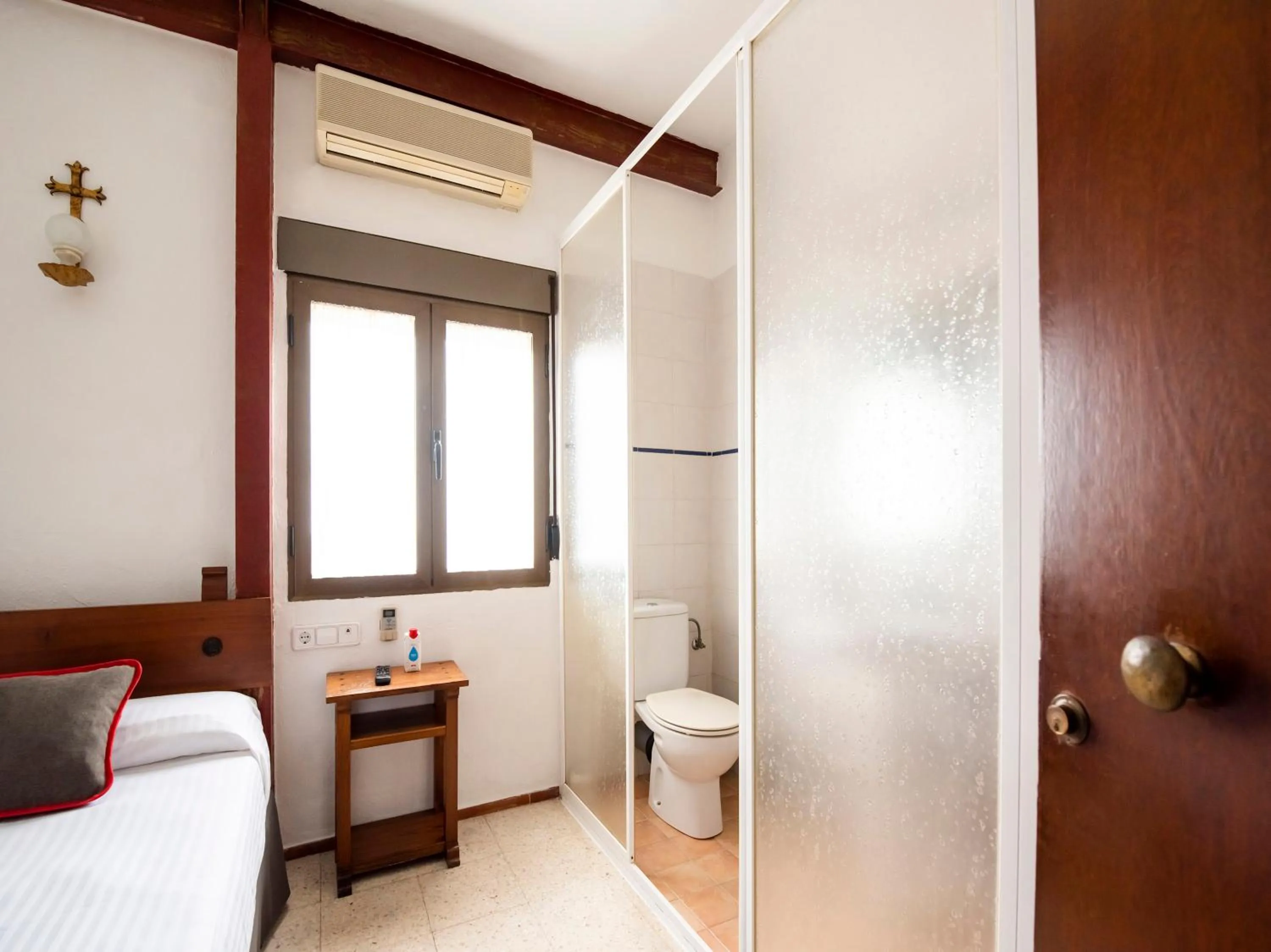 Bed in Hostal Santiago