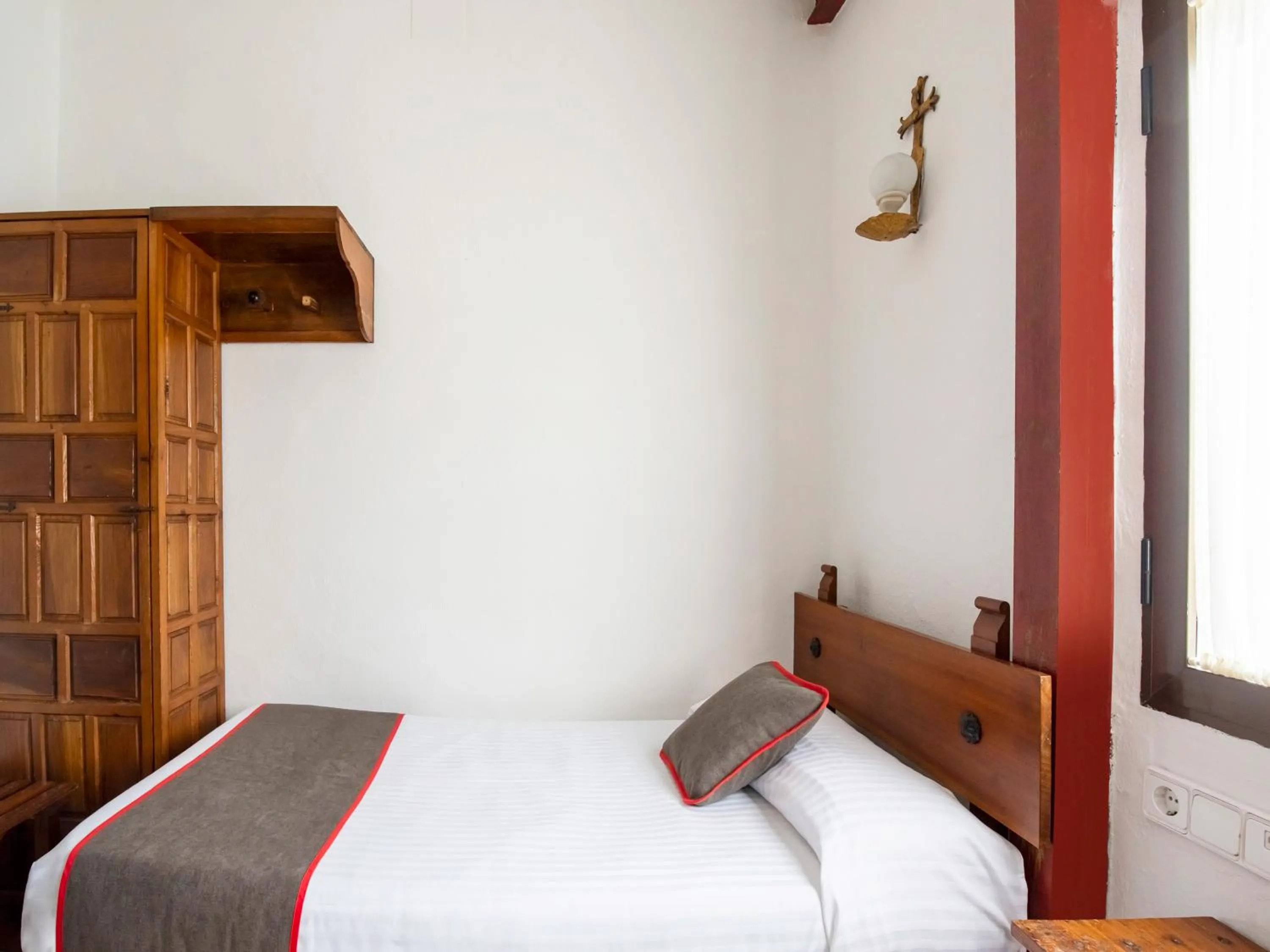 Bed in Hostal Santiago