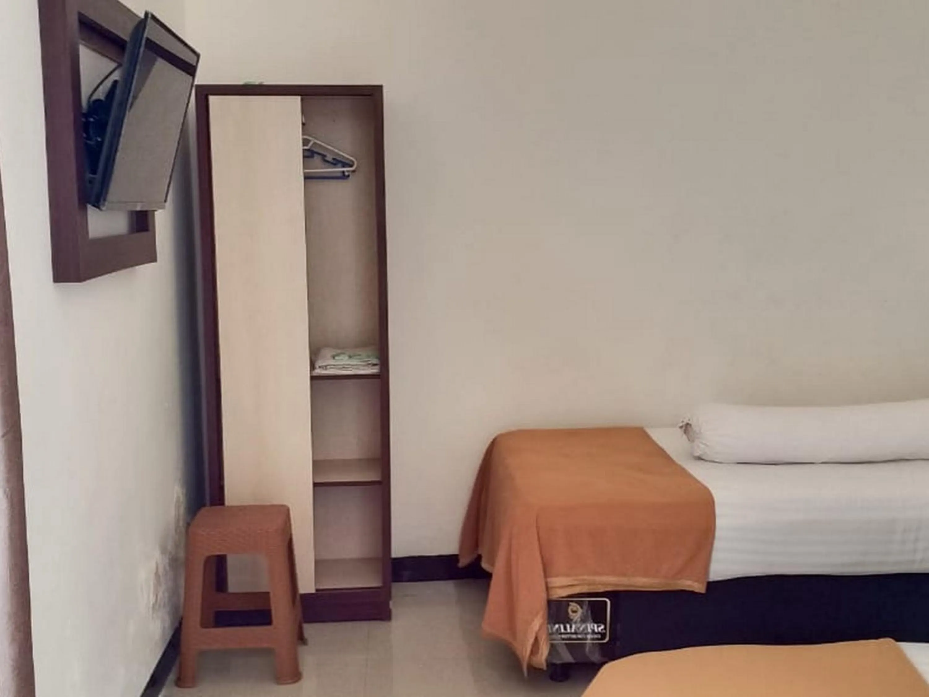 Bed in Fidelia Homestay Palu Mitra RedDoorz