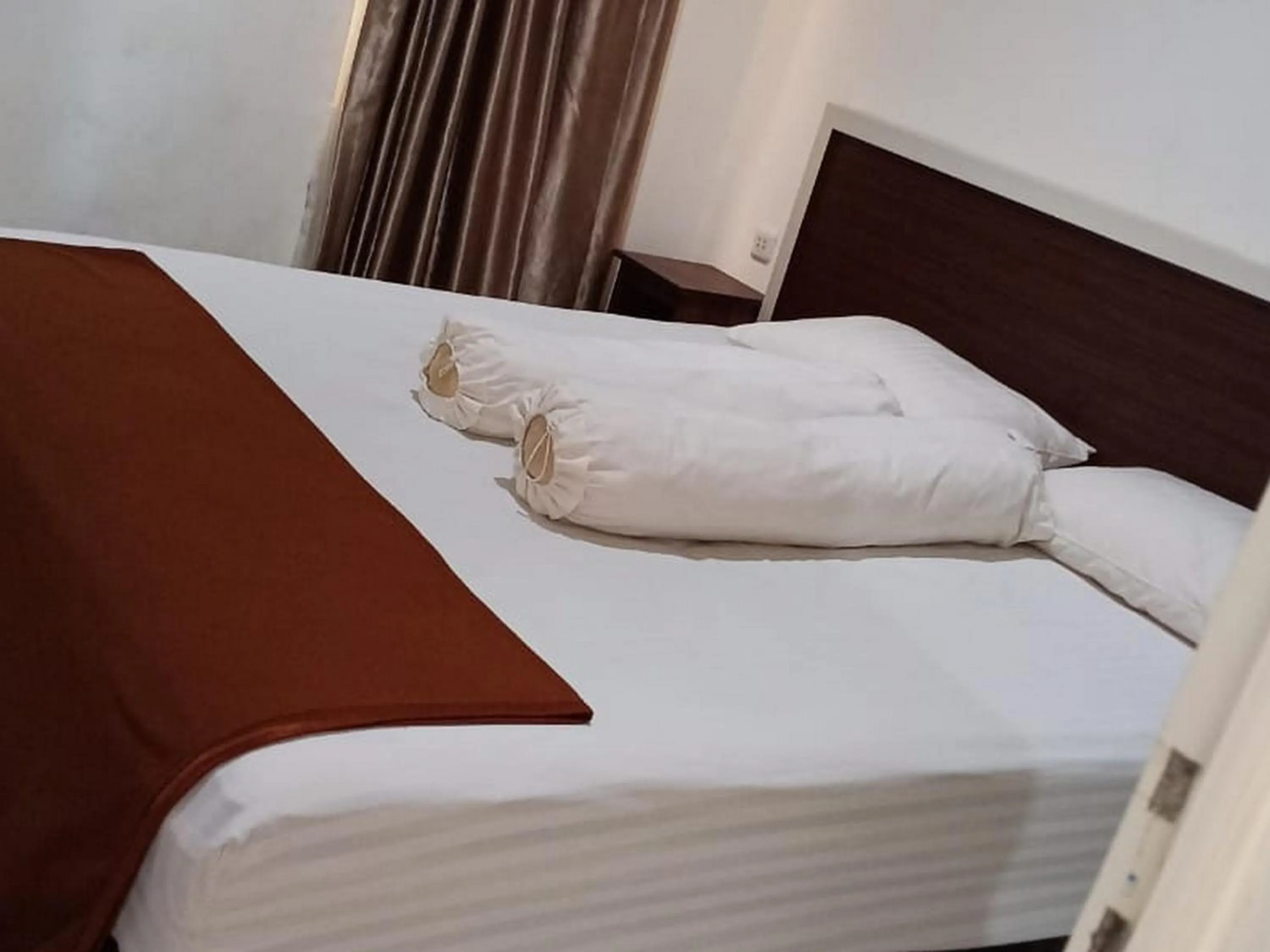 Bed in Fidelia Homestay Palu Mitra RedDoorz