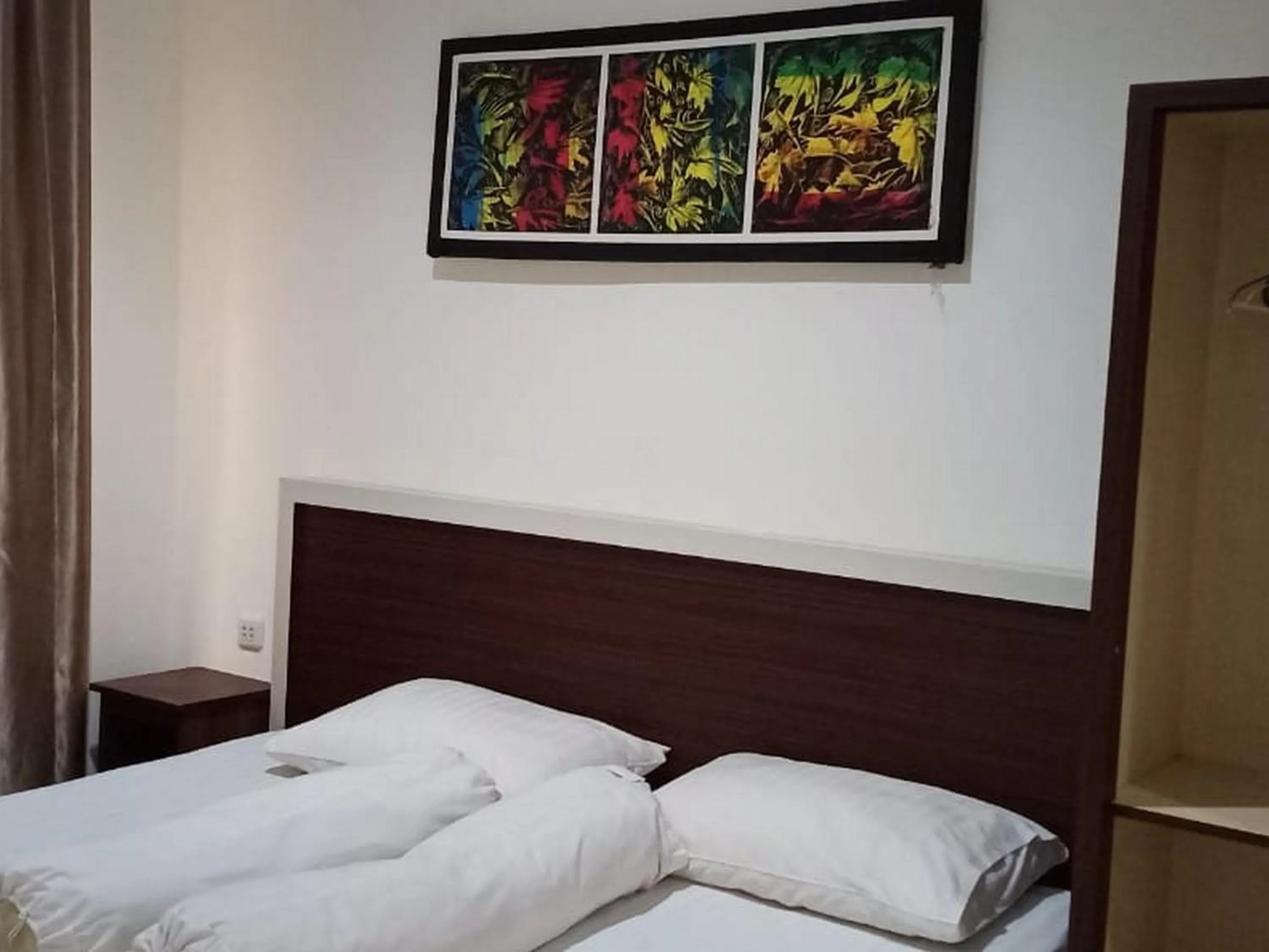 Bed in Fidelia Homestay Palu Mitra RedDoorz