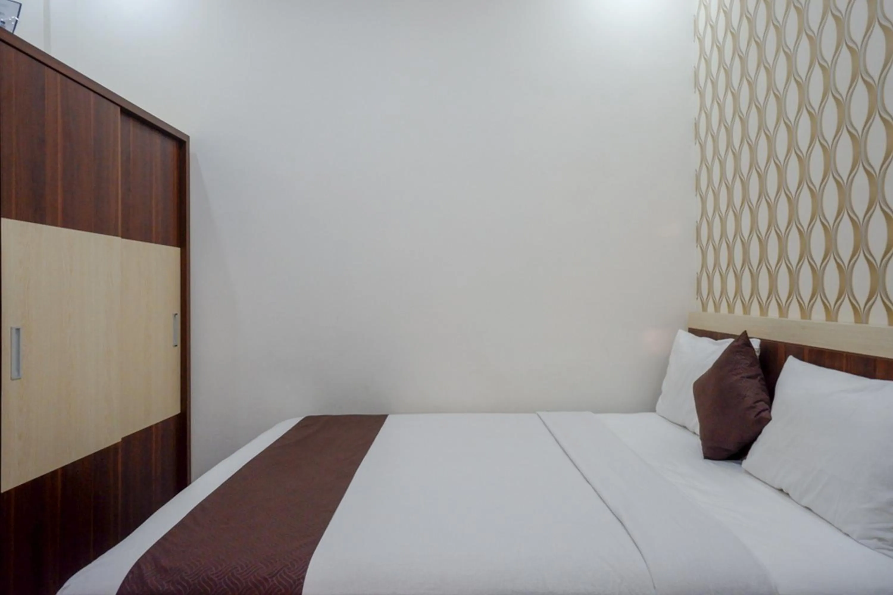 Bed in RedDoorz Syariah at Omah Sawah