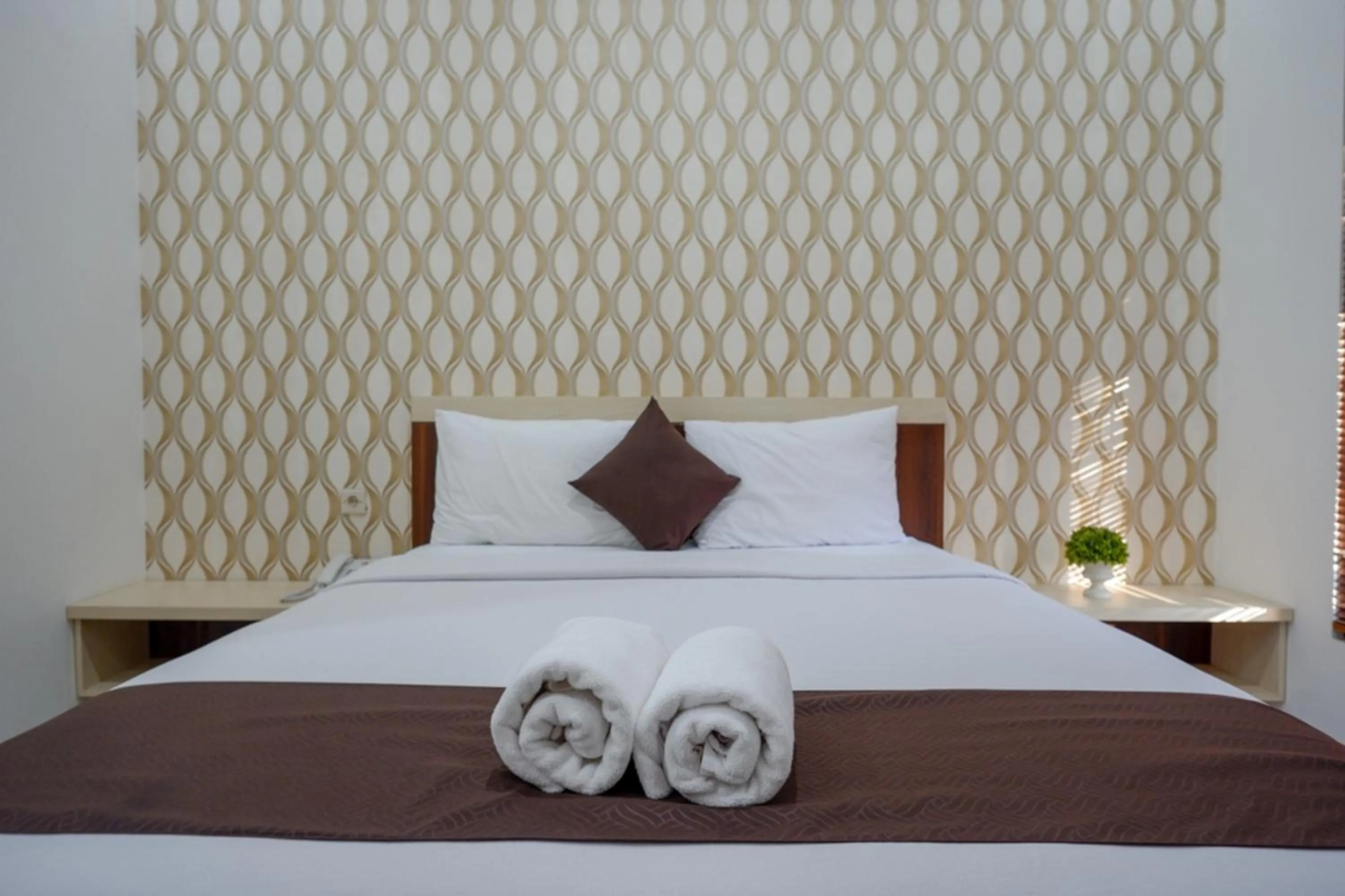 Bed in RedDoorz Syariah at Omah Sawah