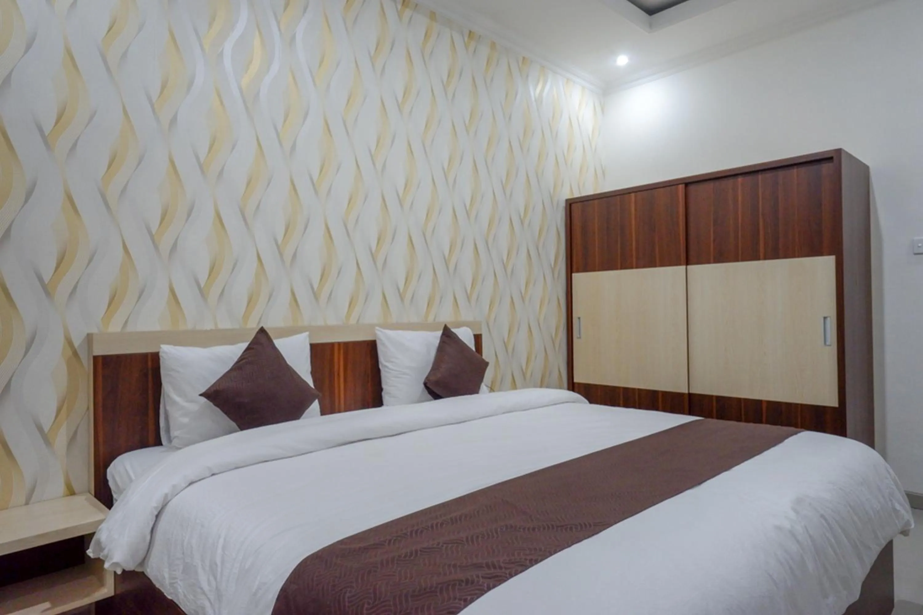 Bed in RedDoorz Syariah at Omah Sawah