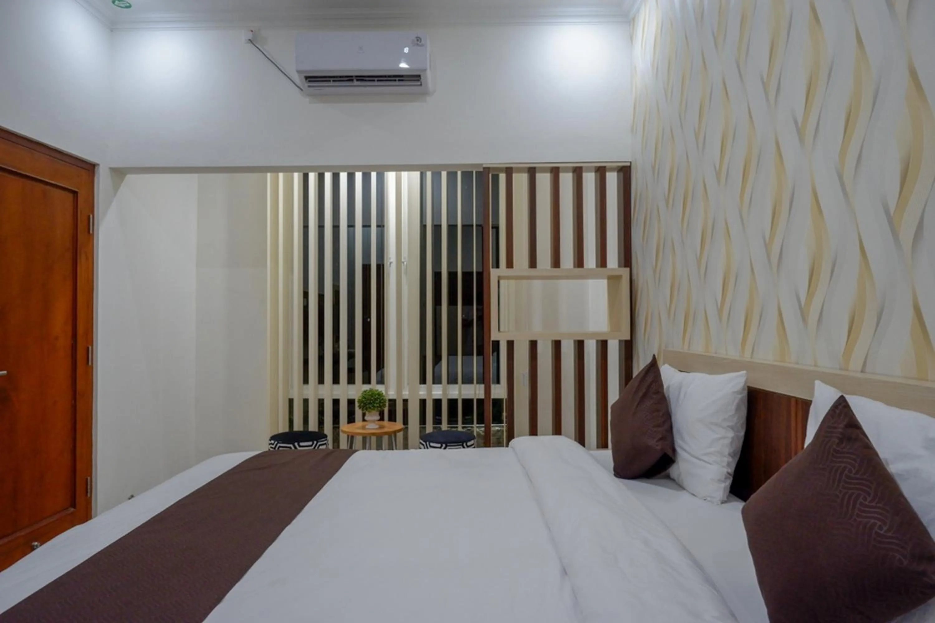 Bed in RedDoorz Syariah at Omah Sawah