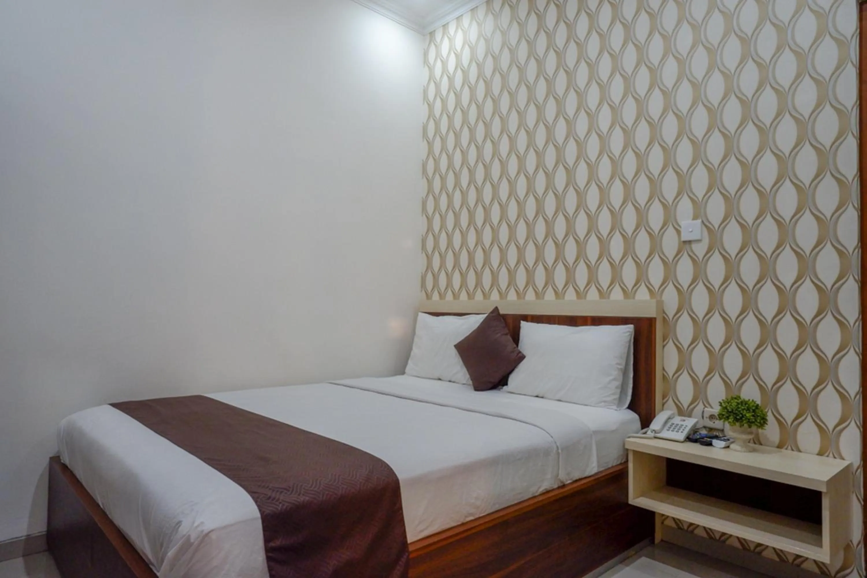 Bed in RedDoorz Syariah at Omah Sawah