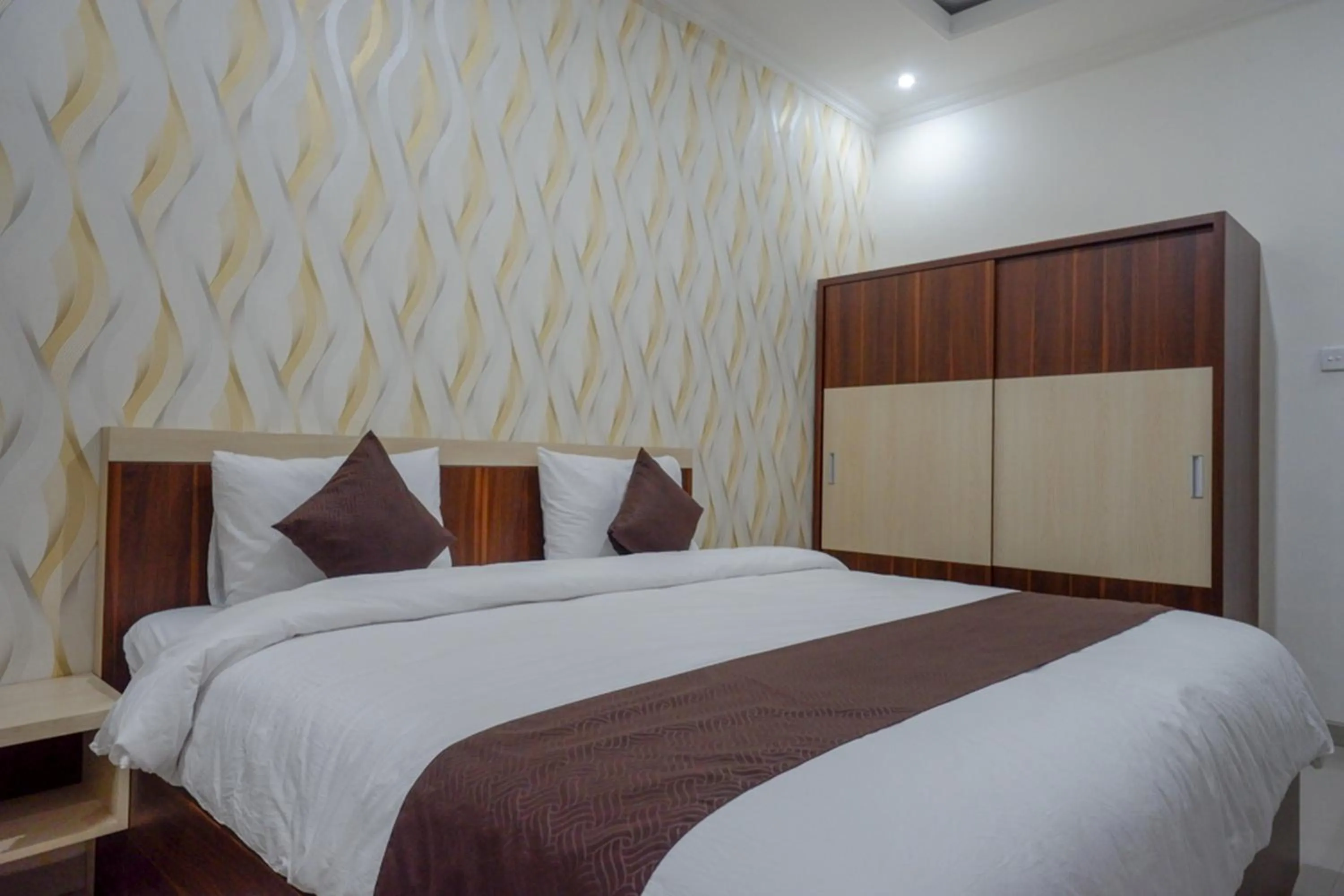 Bed in RedDoorz Syariah at Omah Sawah