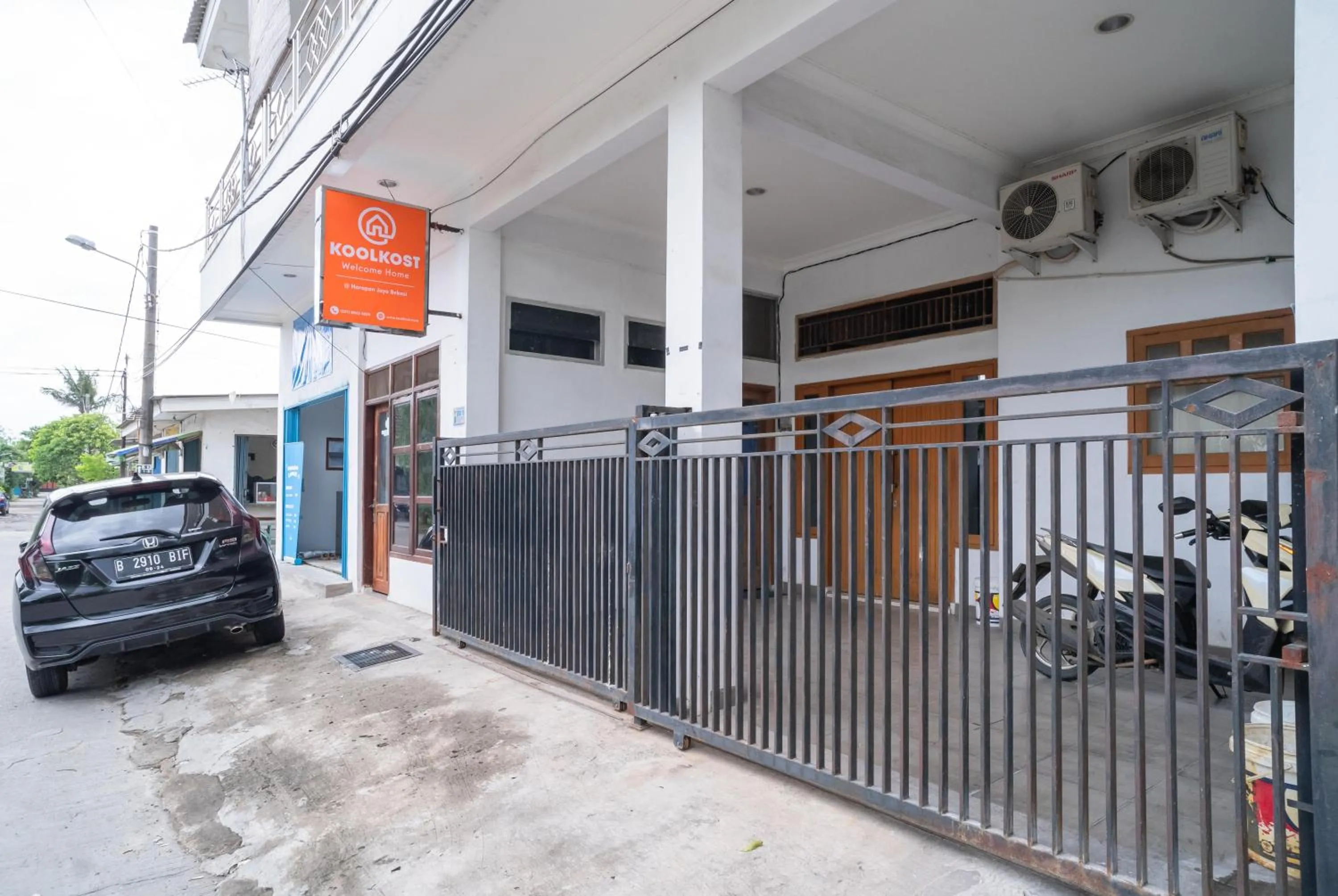 Property logo or sign in KoolKost @ Harapan Jaya Bekasi