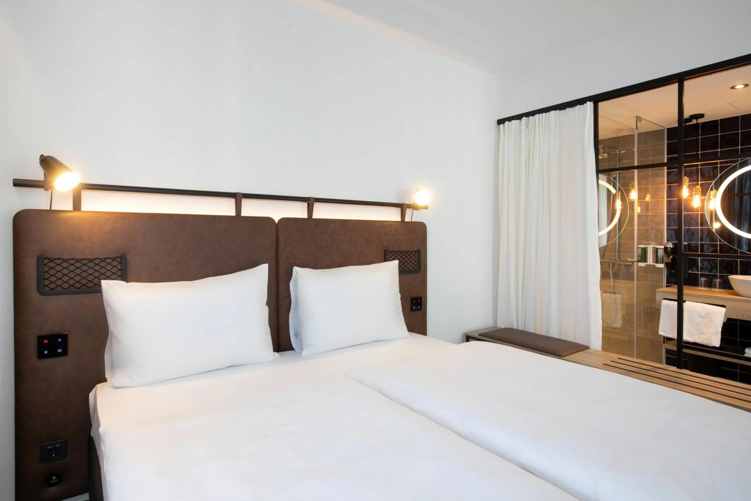 Bed in H2 Hotel Budapest