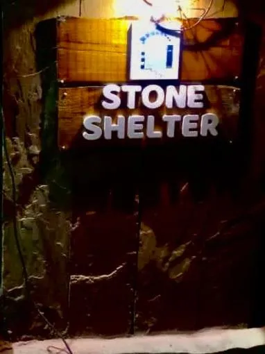 Property logo or sign in Stone shelter