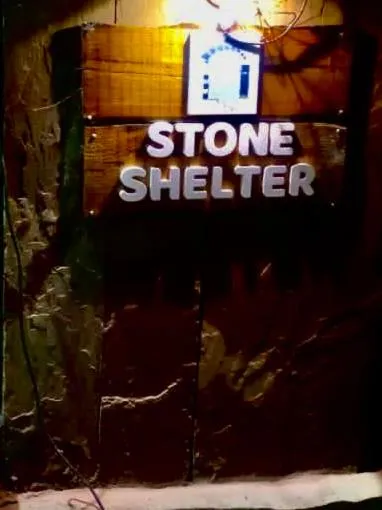 Property logo or sign in Stone shelter