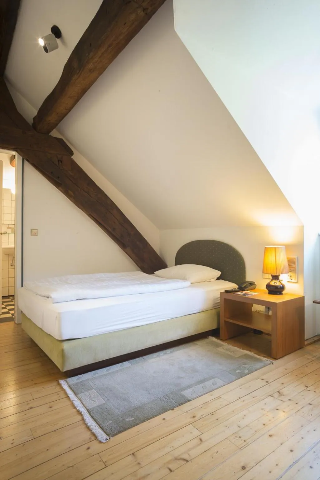 Photo of the whole room, Bed in Hotel Altes Pfarrhaus Beaumarais