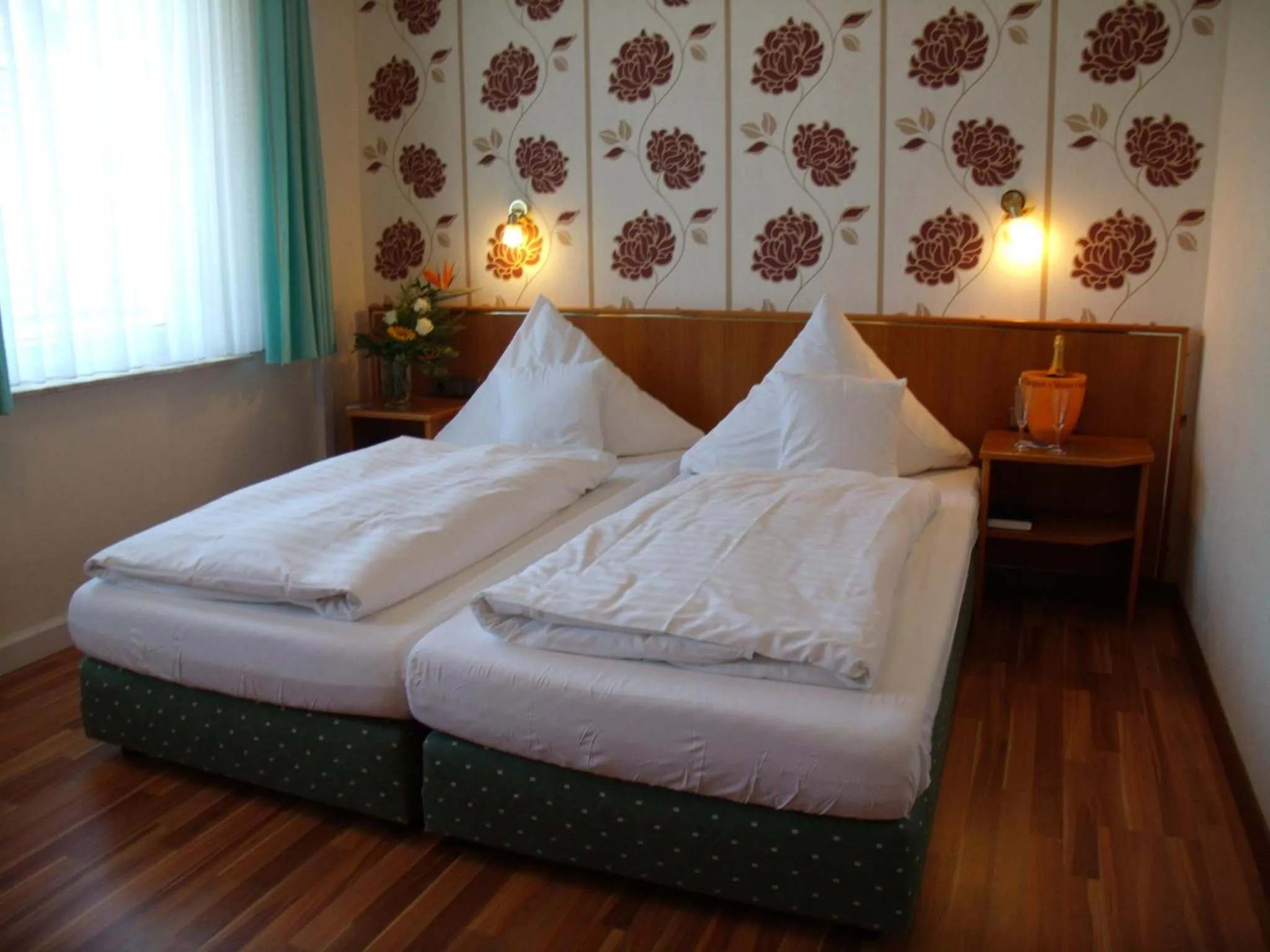 Photo of the whole room, Bed in Landhotel Zum Niestetal
