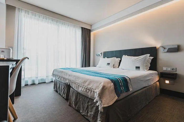 Bed in H Boutique Peña Parda