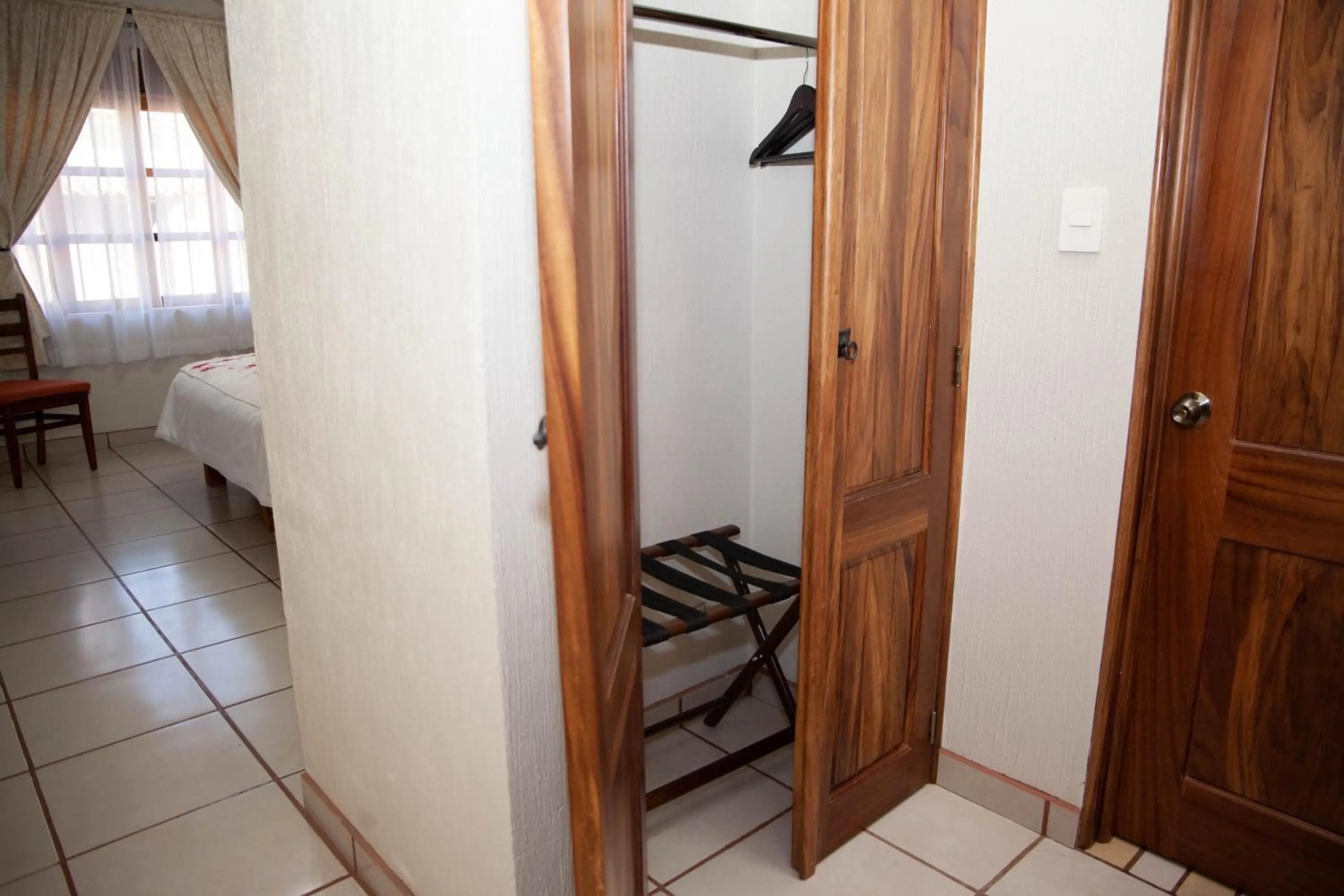 Photo of the whole room, Bed in Encanto de la Sierra Hotel