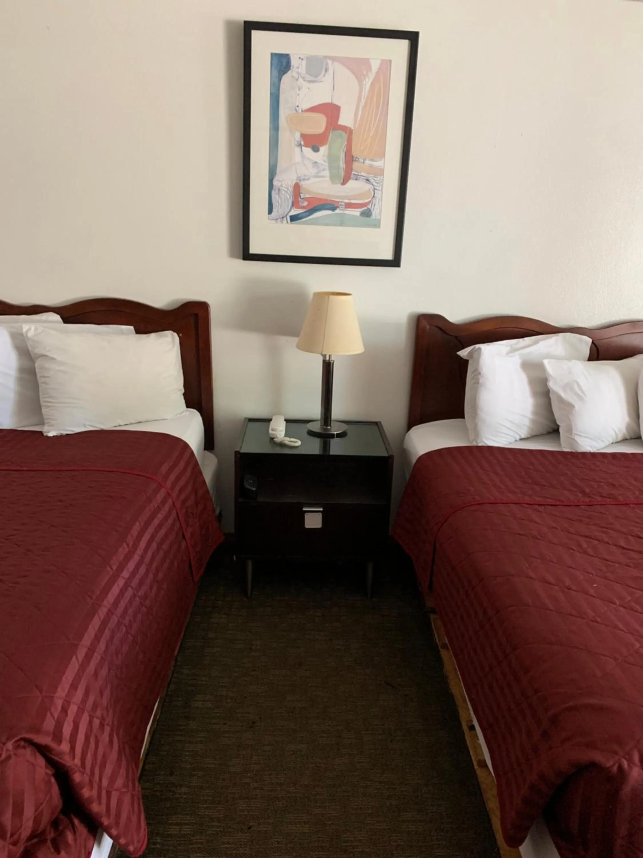 Bed in Smokey Point Motor Inn