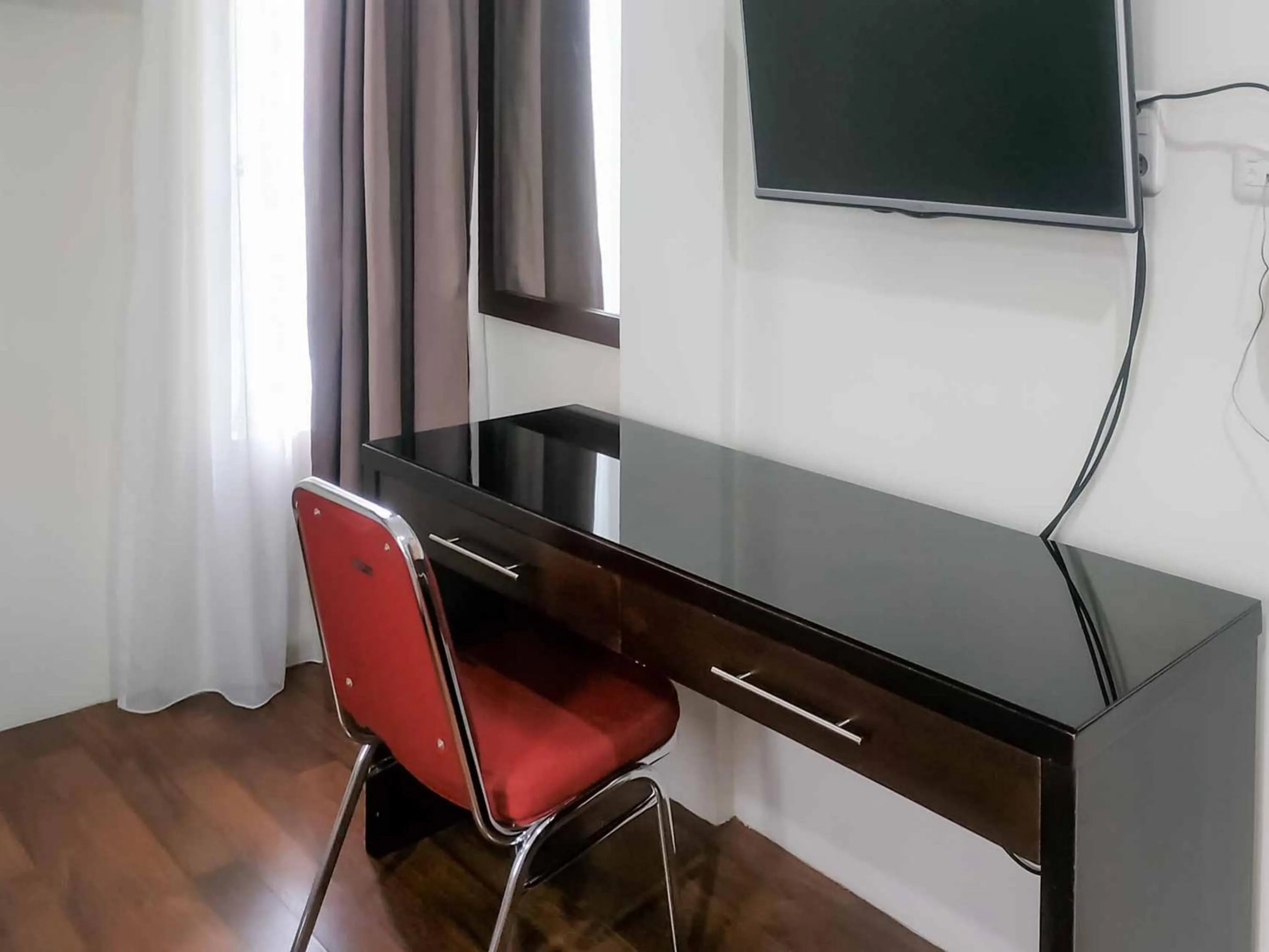 TV and multimedia in Avalon Karawaci Mitra RedDoorz