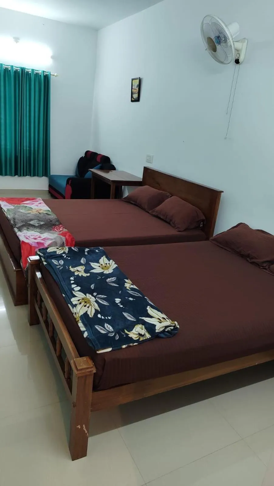 Bed in CHILLAX Resorts Palakkayam THATTU