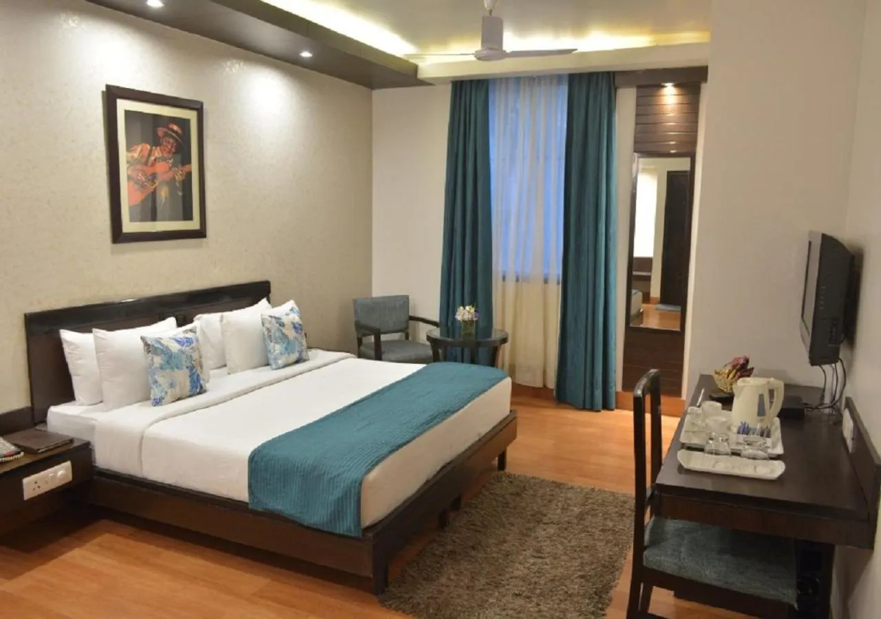 Bedroom, Bed in Hotel Rockland Panchsheel Enclave