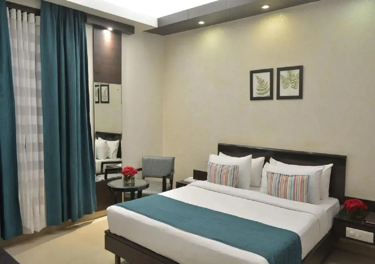 Bed in Hotel Rockland Panchsheel Enclave