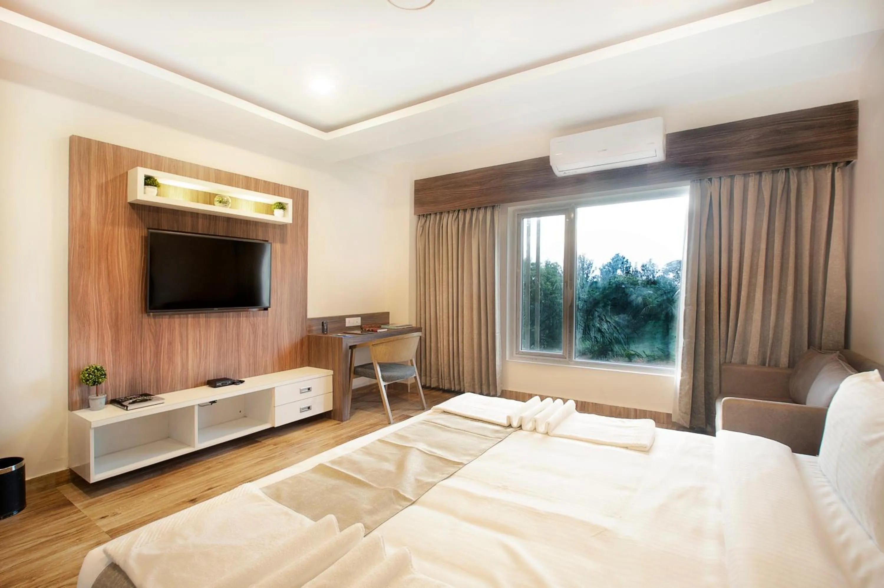 Seating area, Bed in ABM Boutique Hotel