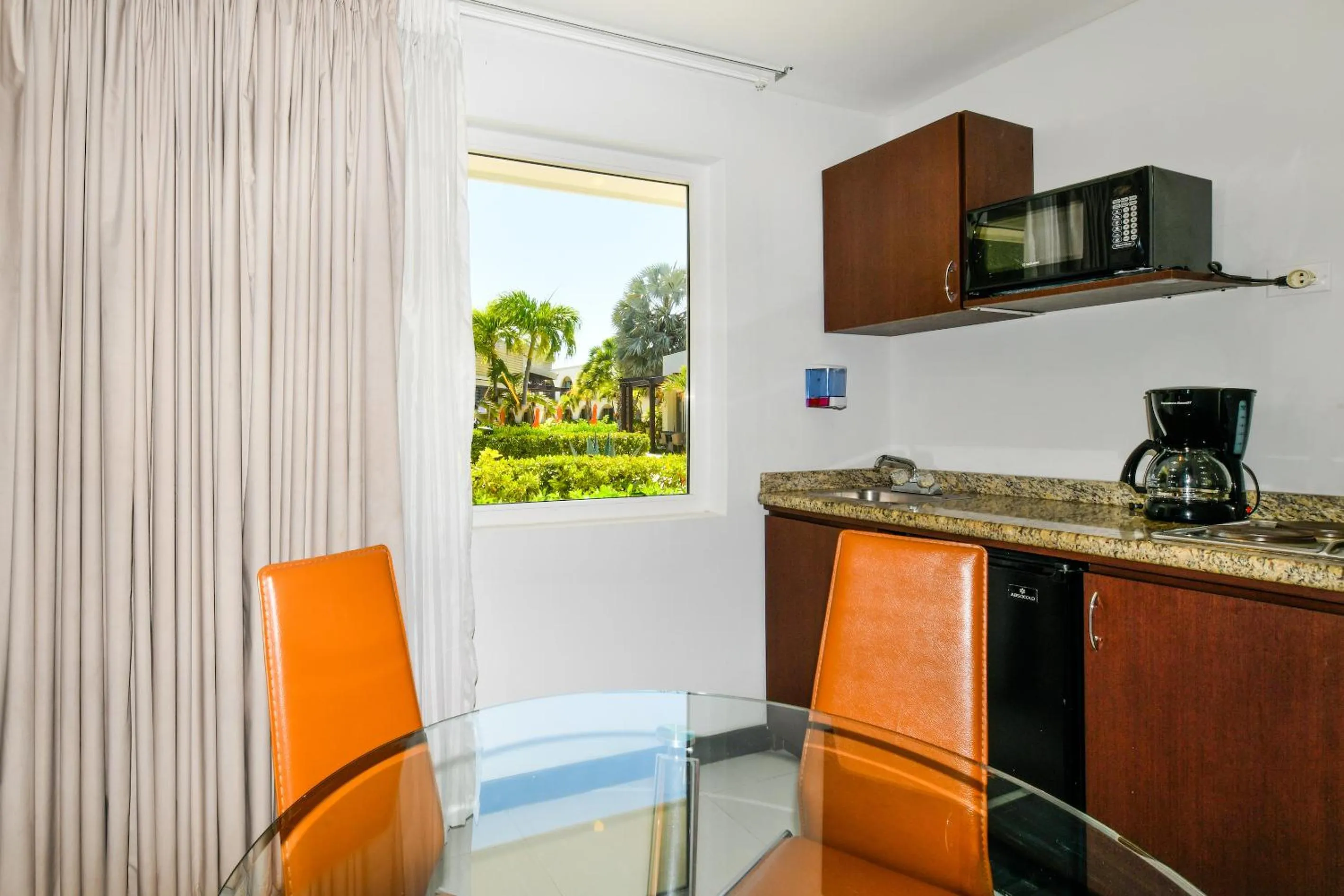 Kitchen or kitchenette in Talk of the Town Beach Hotel & Beach Club by GH Hoteles