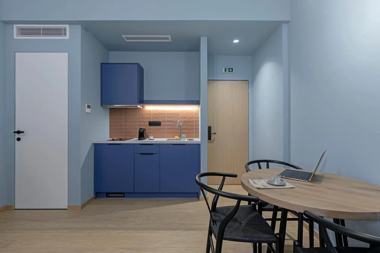 Kitchen or kitchenette in Acro Urban Suites
