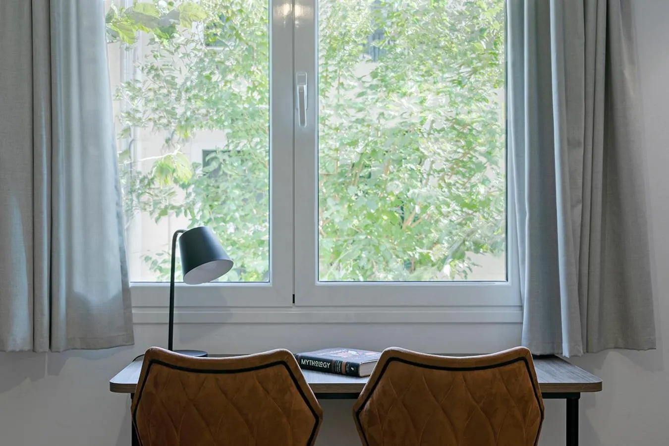 Seating area in Acro Urban Suites