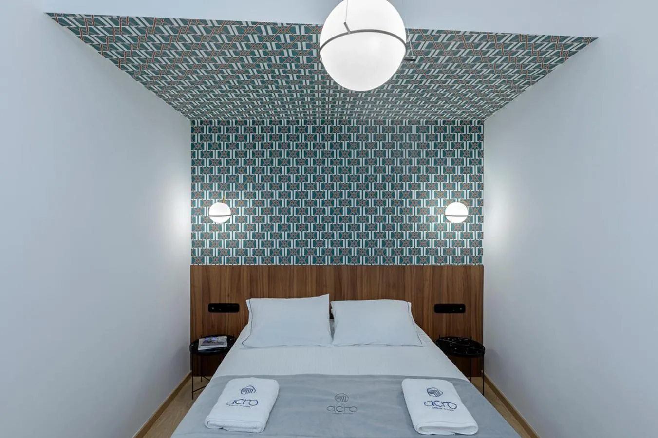 Bed in Acro Urban Suites