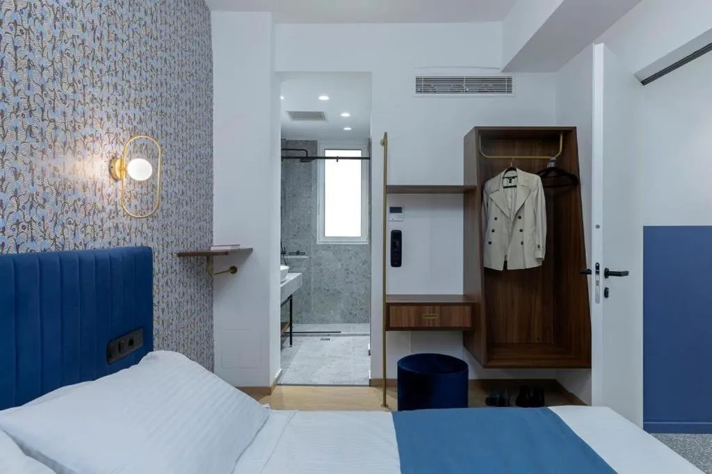Bed in Acro Urban Suites