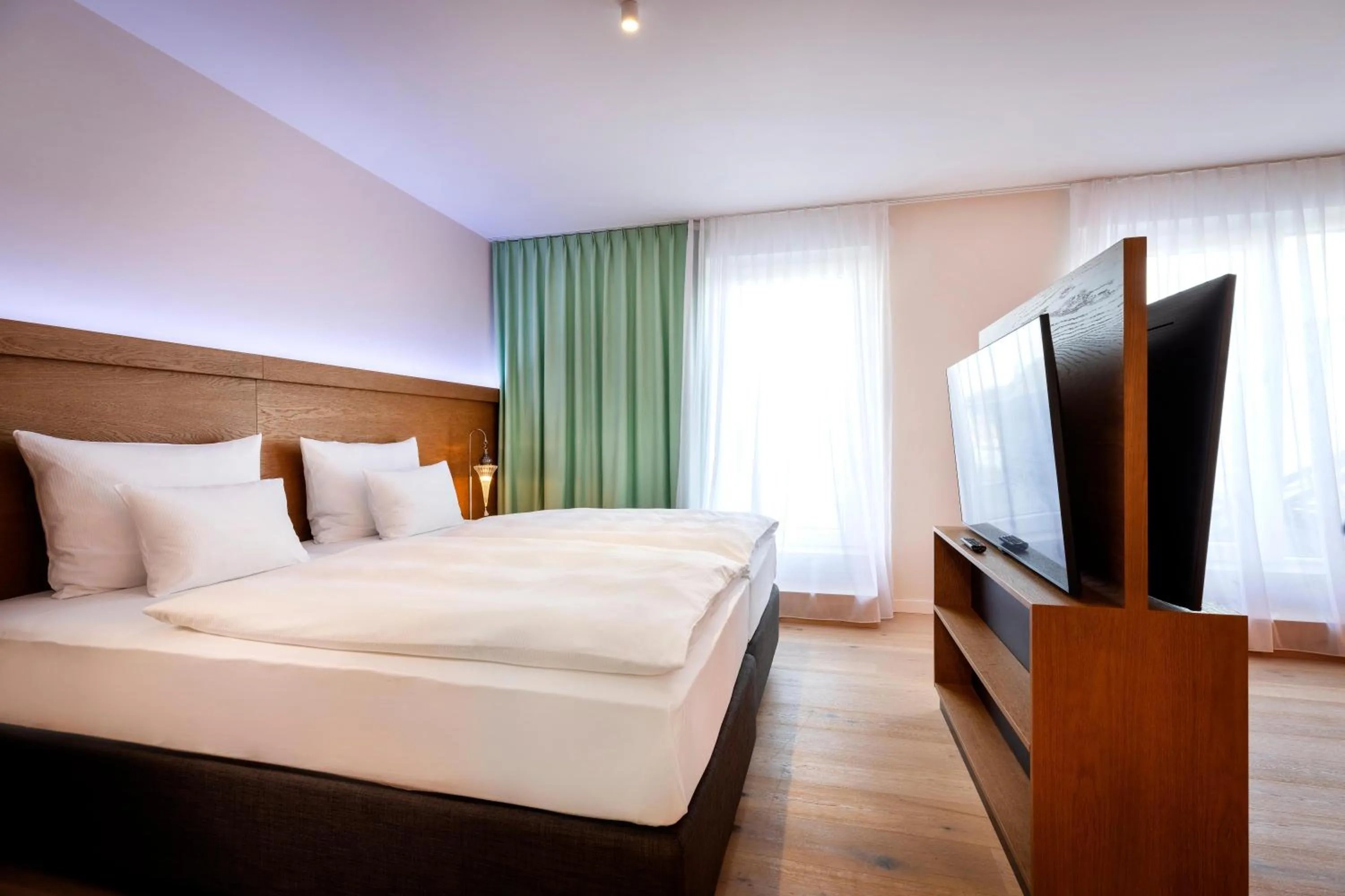 Bed in ARCOTEL HafenCity Dresden