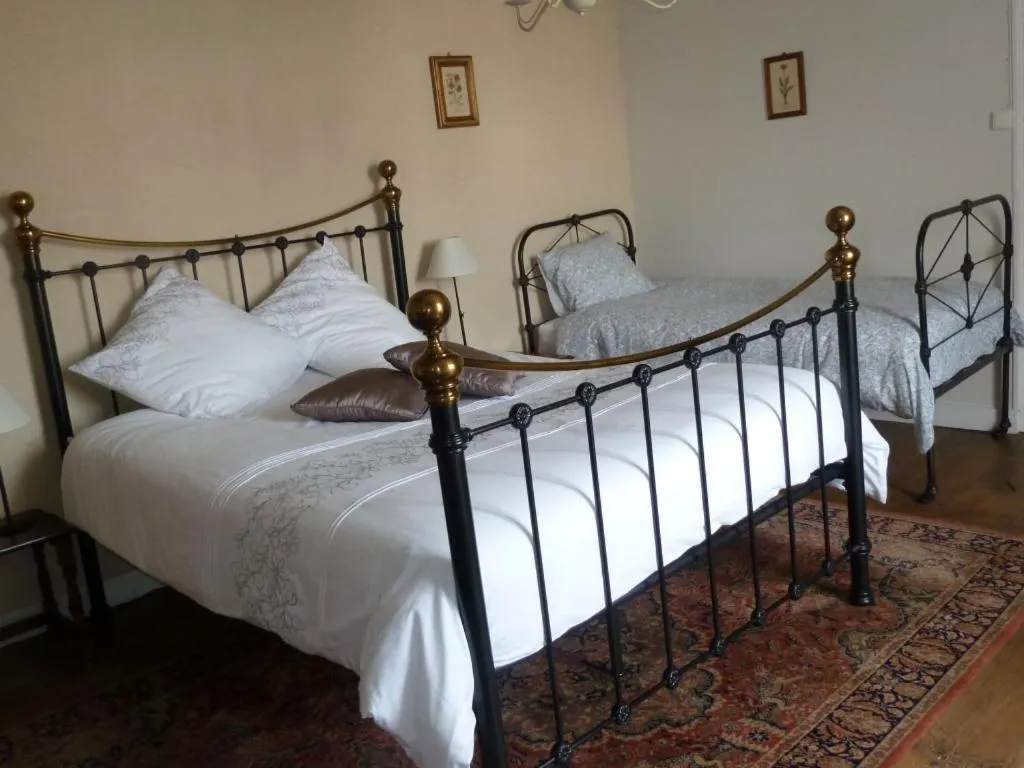 Bed in A L'Ombre Du Marronnier GITES