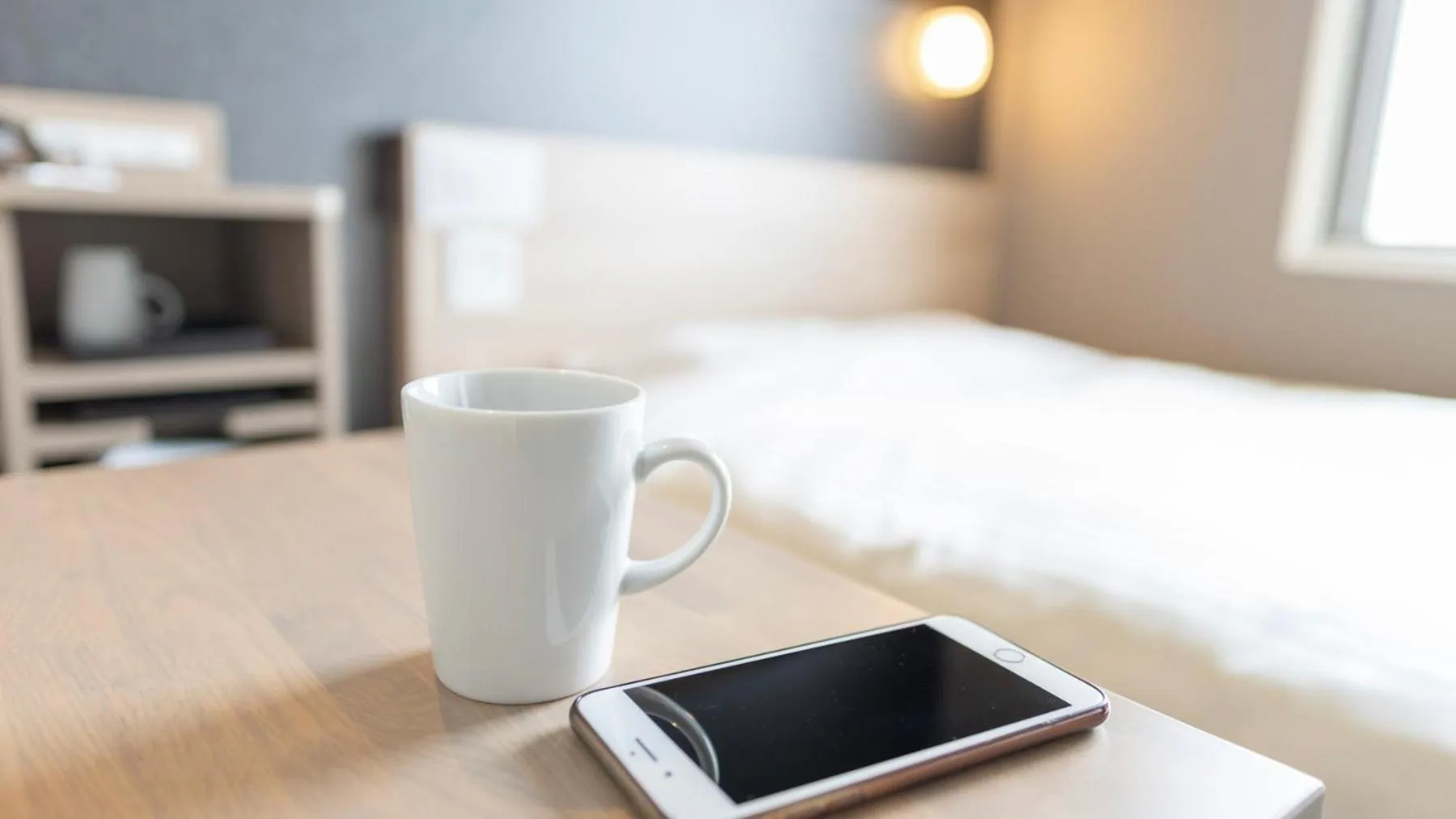 Bed in Super Hotel Kanku Kumatoriekimae