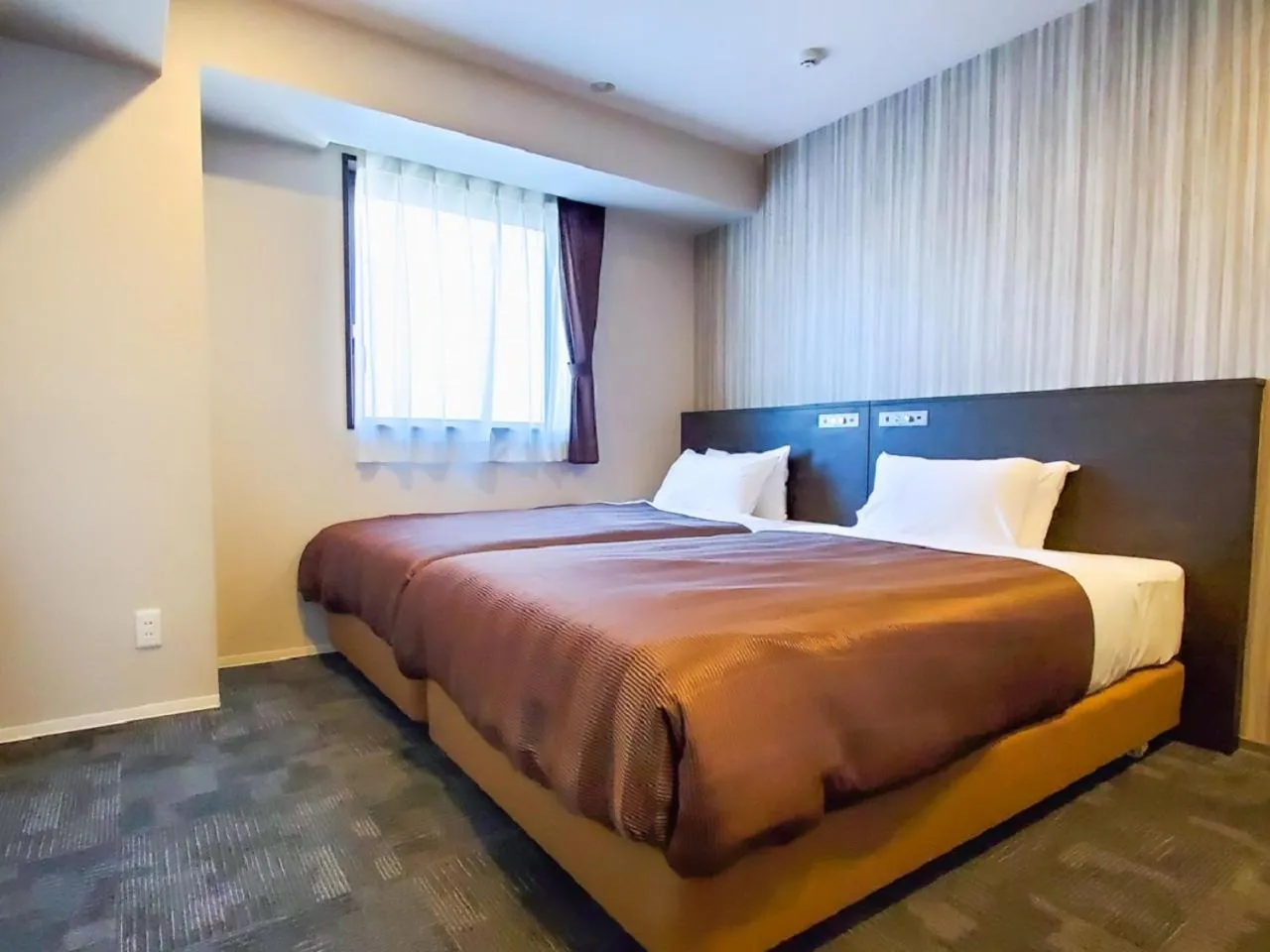 Bed in HOTEL LiVEMAX Tachikawa Ekimae
