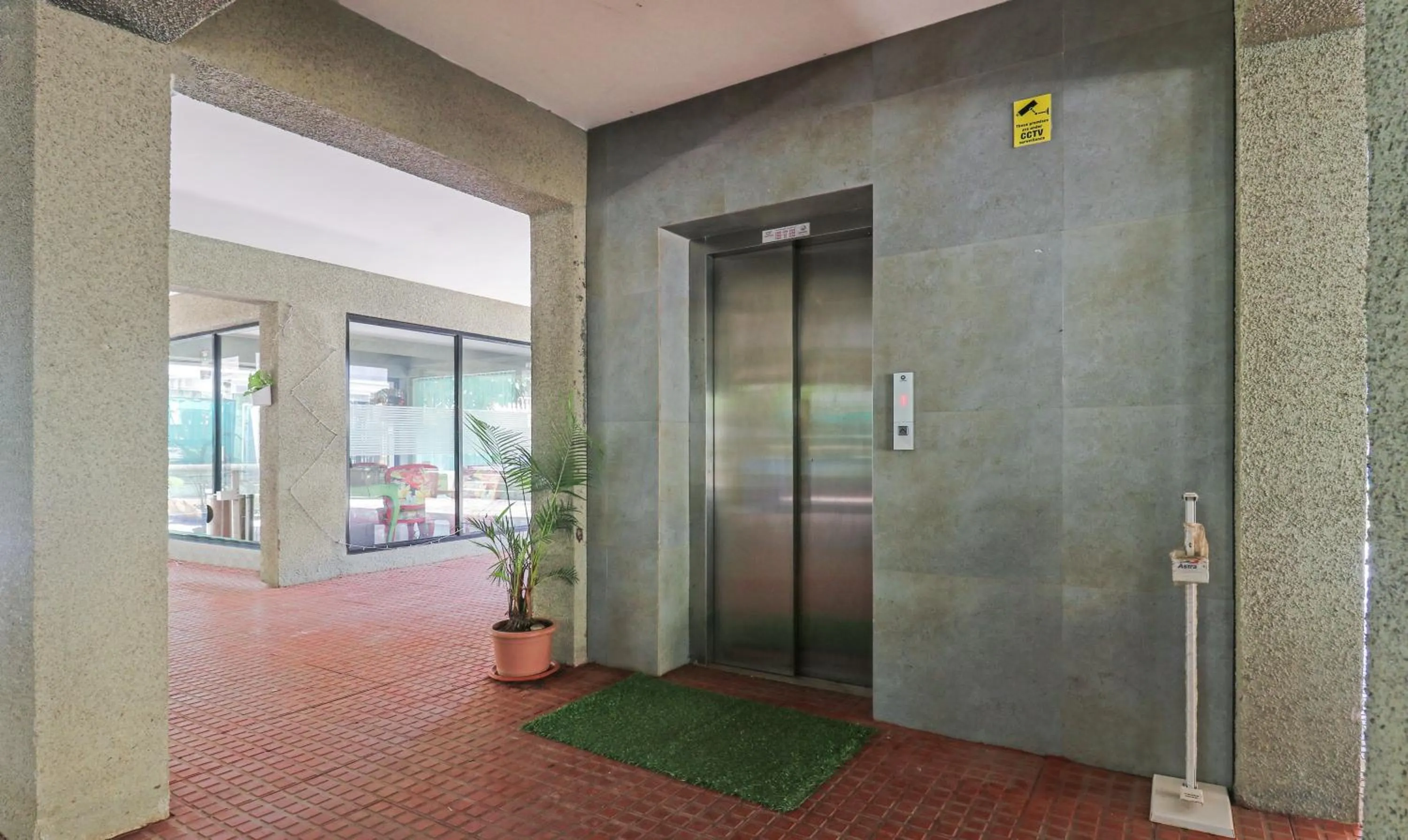 elevator in Treebo Aquamarine Arpora With Pool