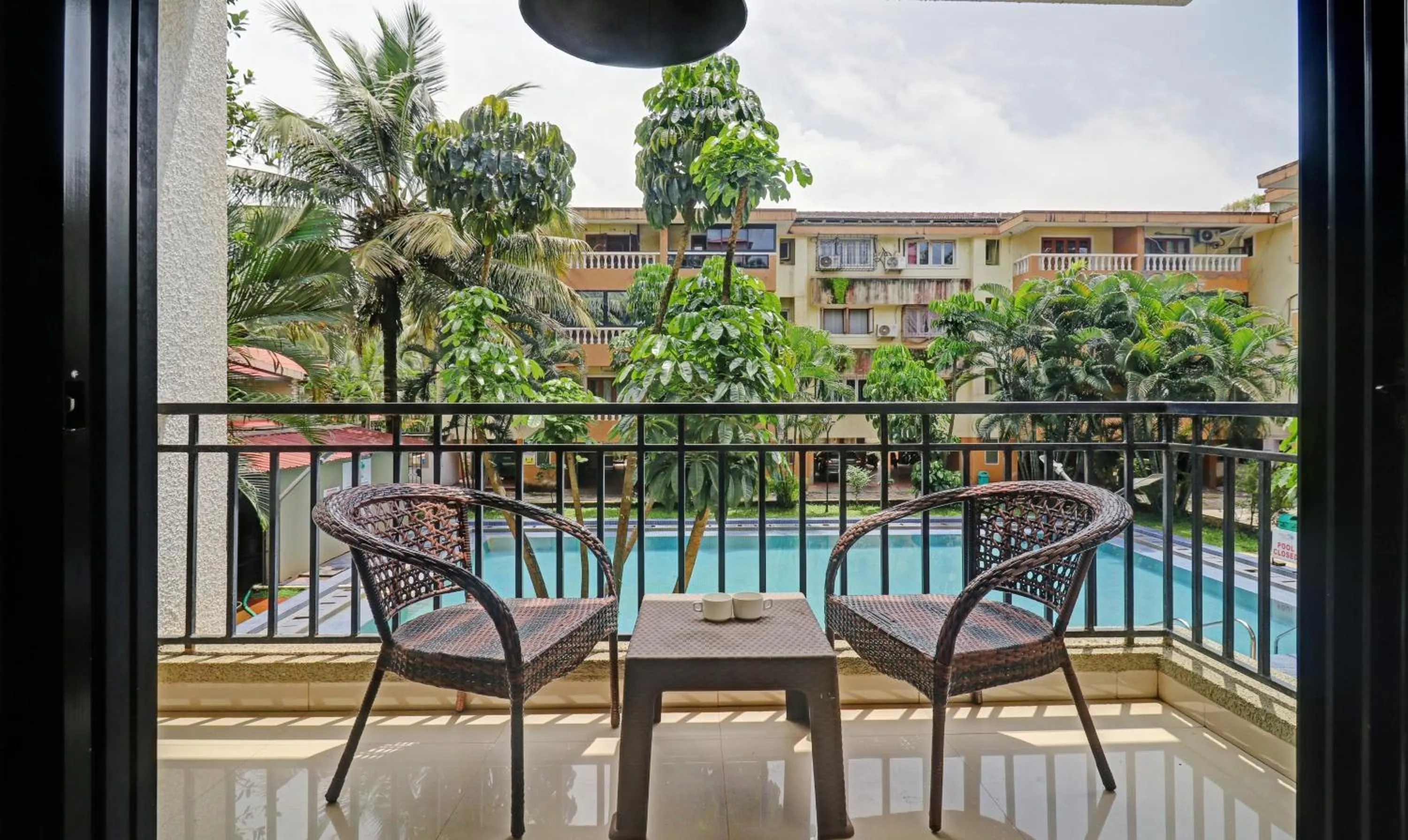 Balcony/Terrace in Treebo Aquamarine Arpora With Pool
