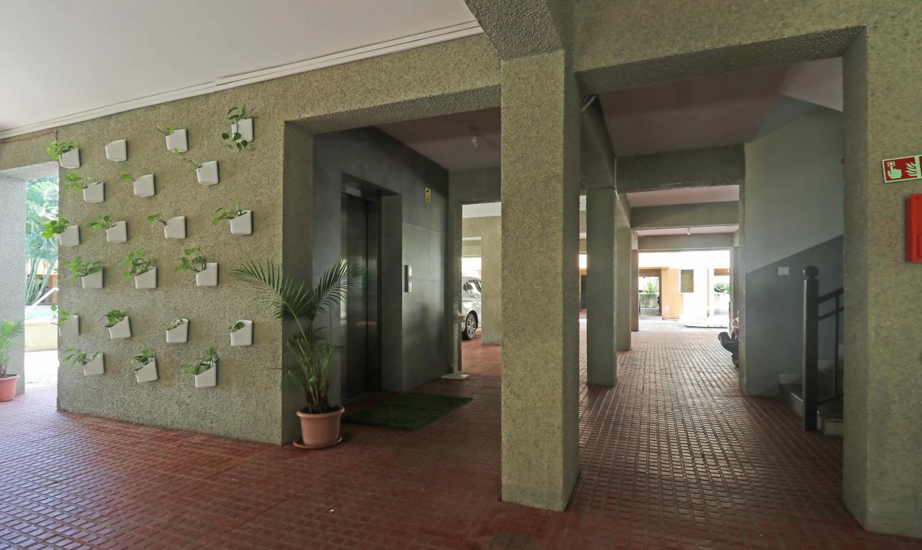 elevator in Treebo Aquamarine Arpora With Pool