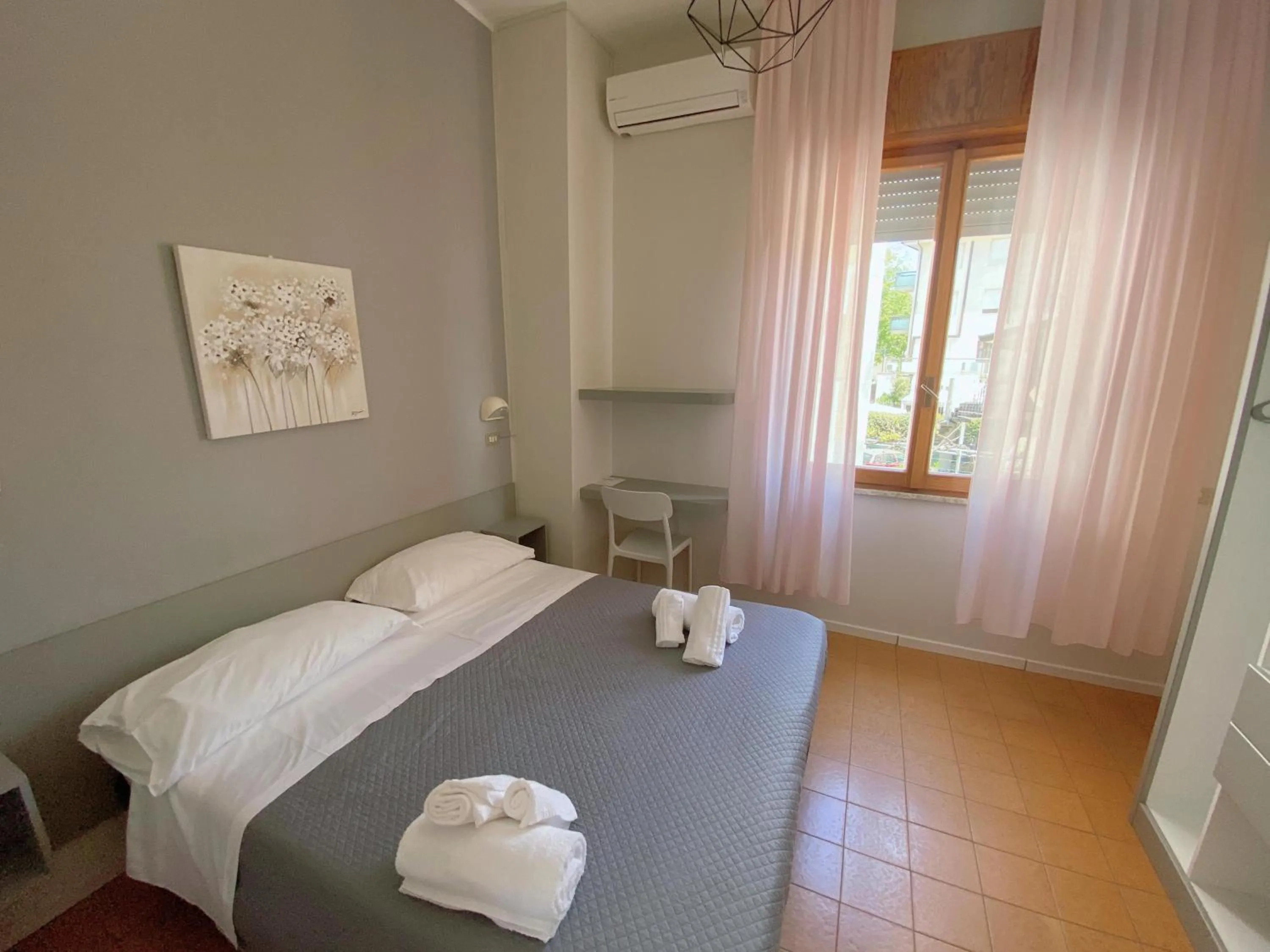 Bedroom in Hotel Residence Ponente