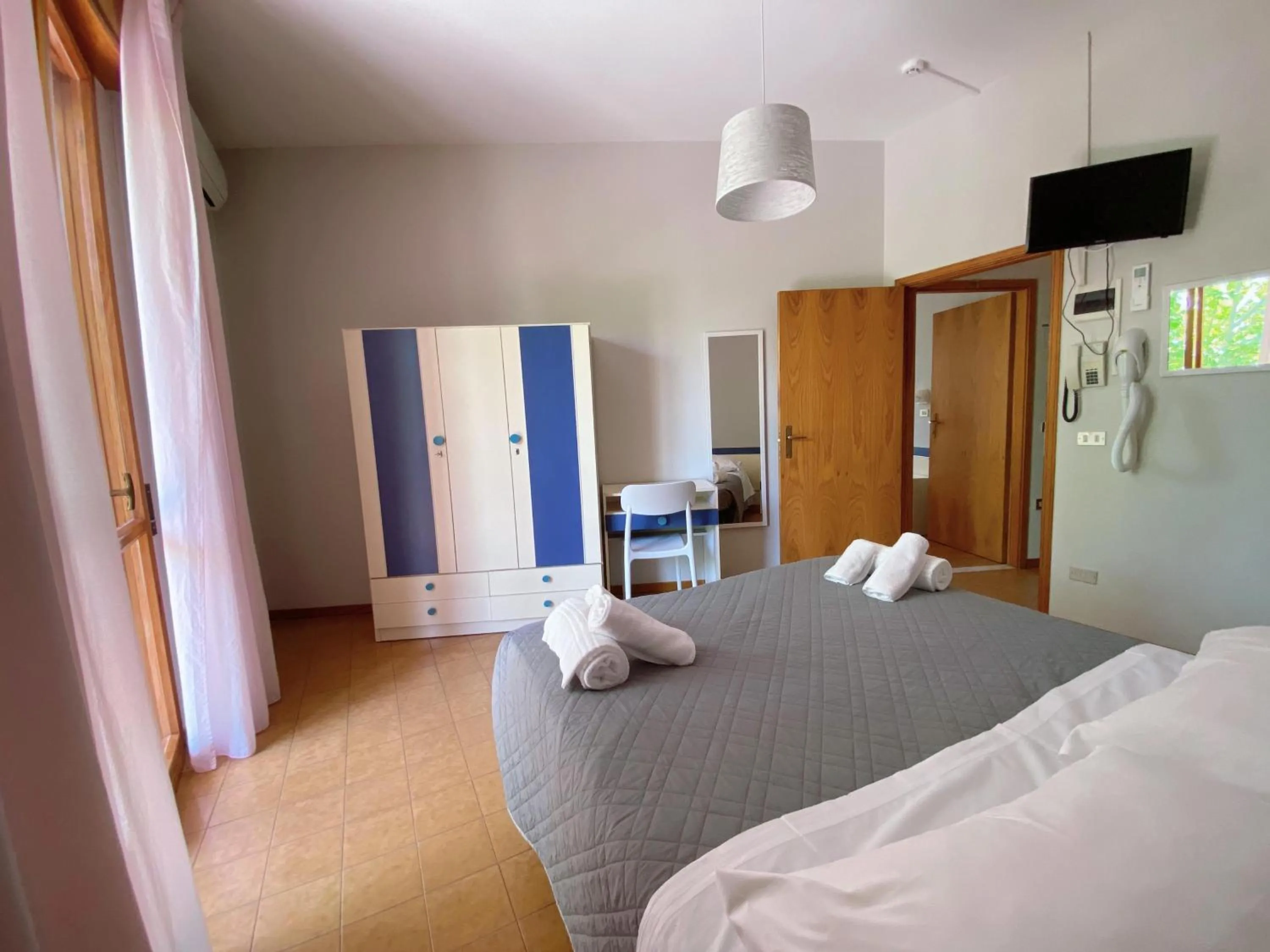 Bedroom in Hotel Residence Ponente