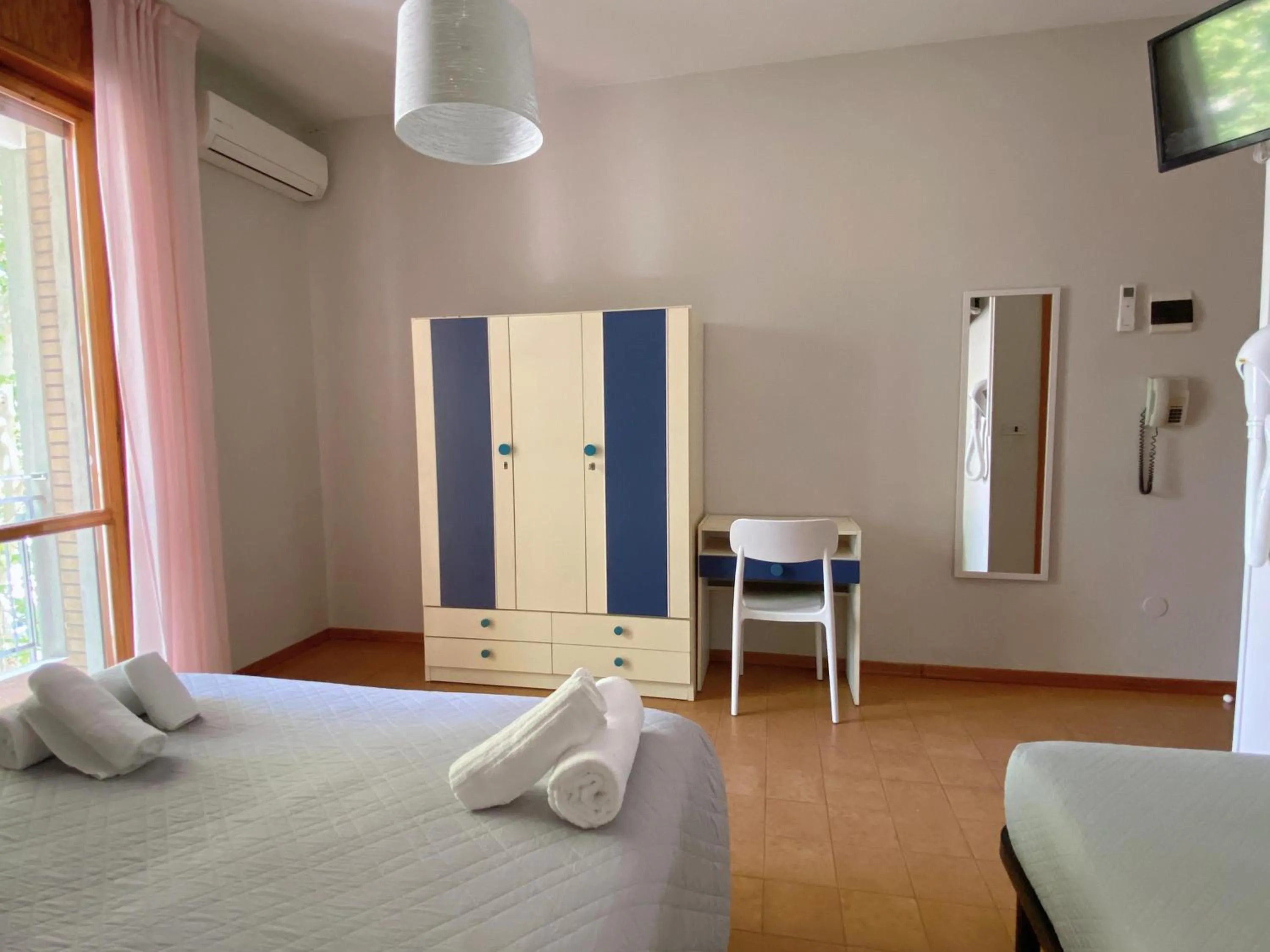 Bedroom in Hotel Residence Ponente