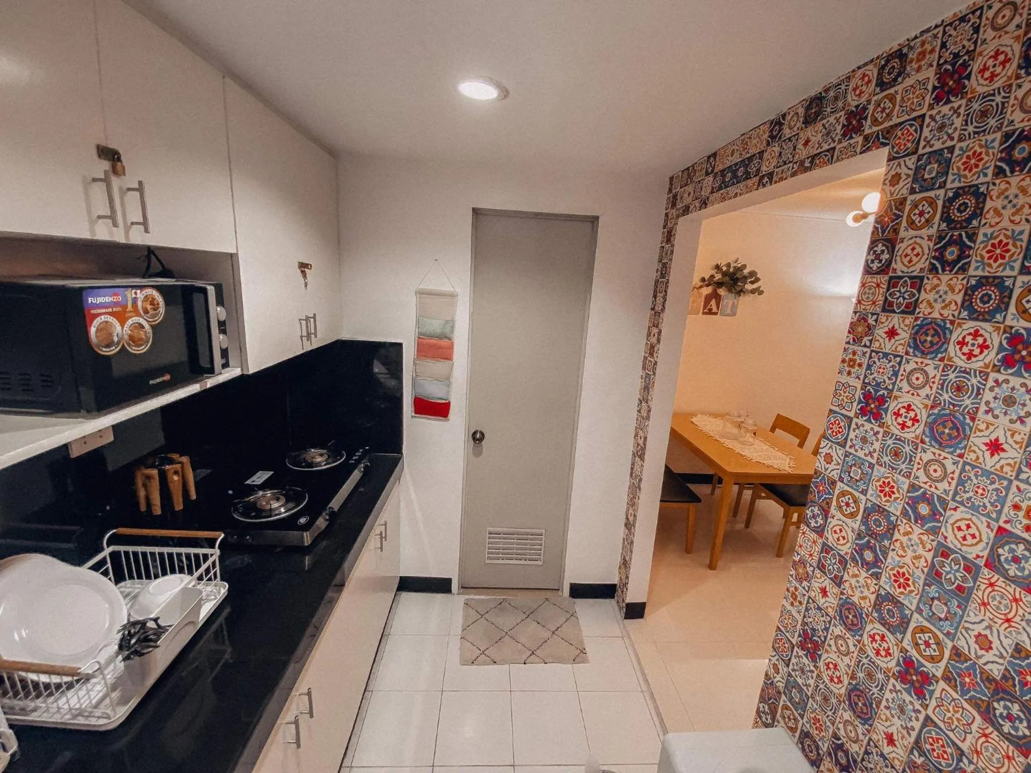 Kitchen or kitchenette in Cozy Themed 2BR TownHouse - near Clark Airport - TRP1