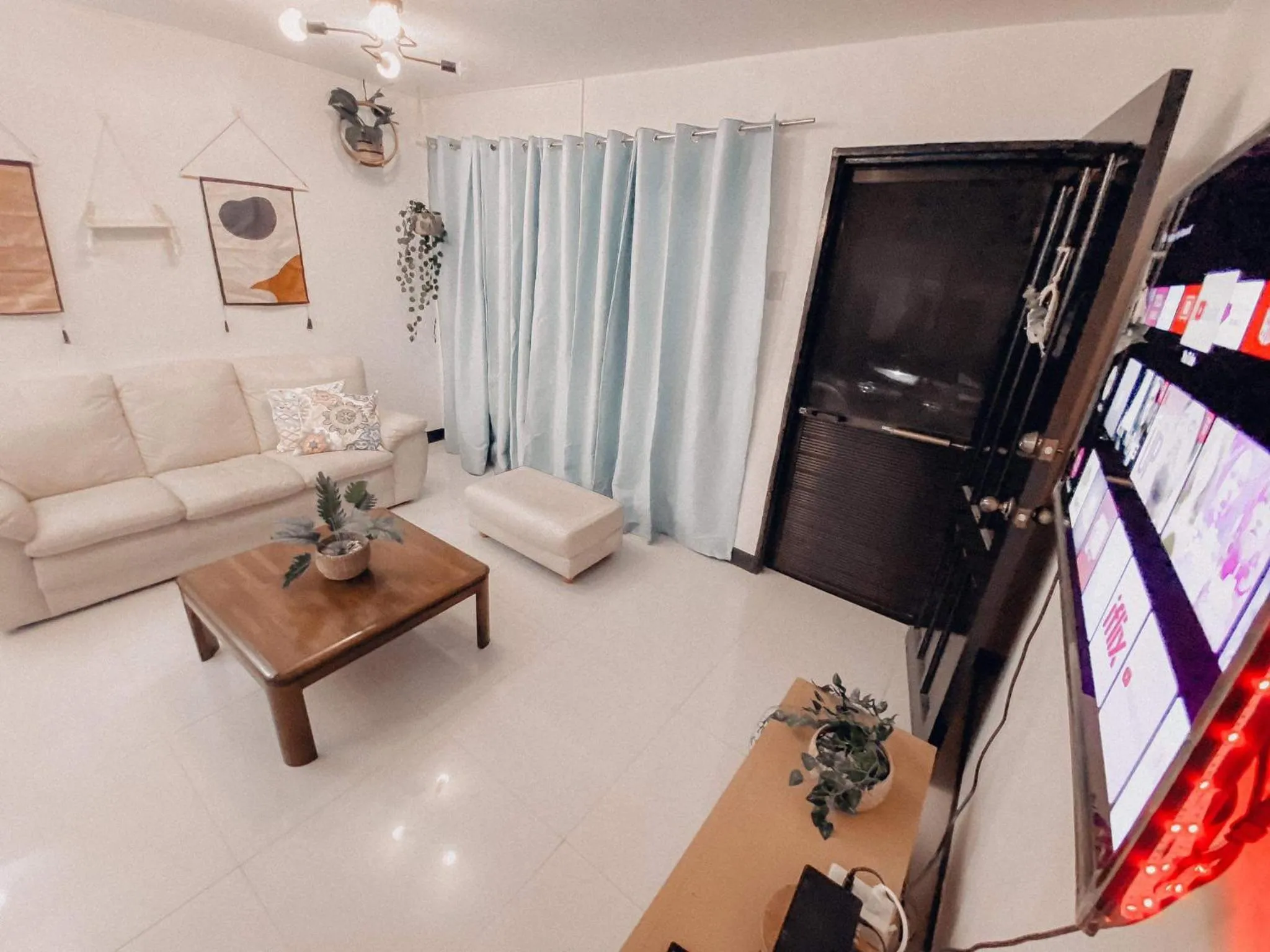 TV and multimedia in Cozy Themed 2BR TownHouse - near Clark Airport - TRP1
