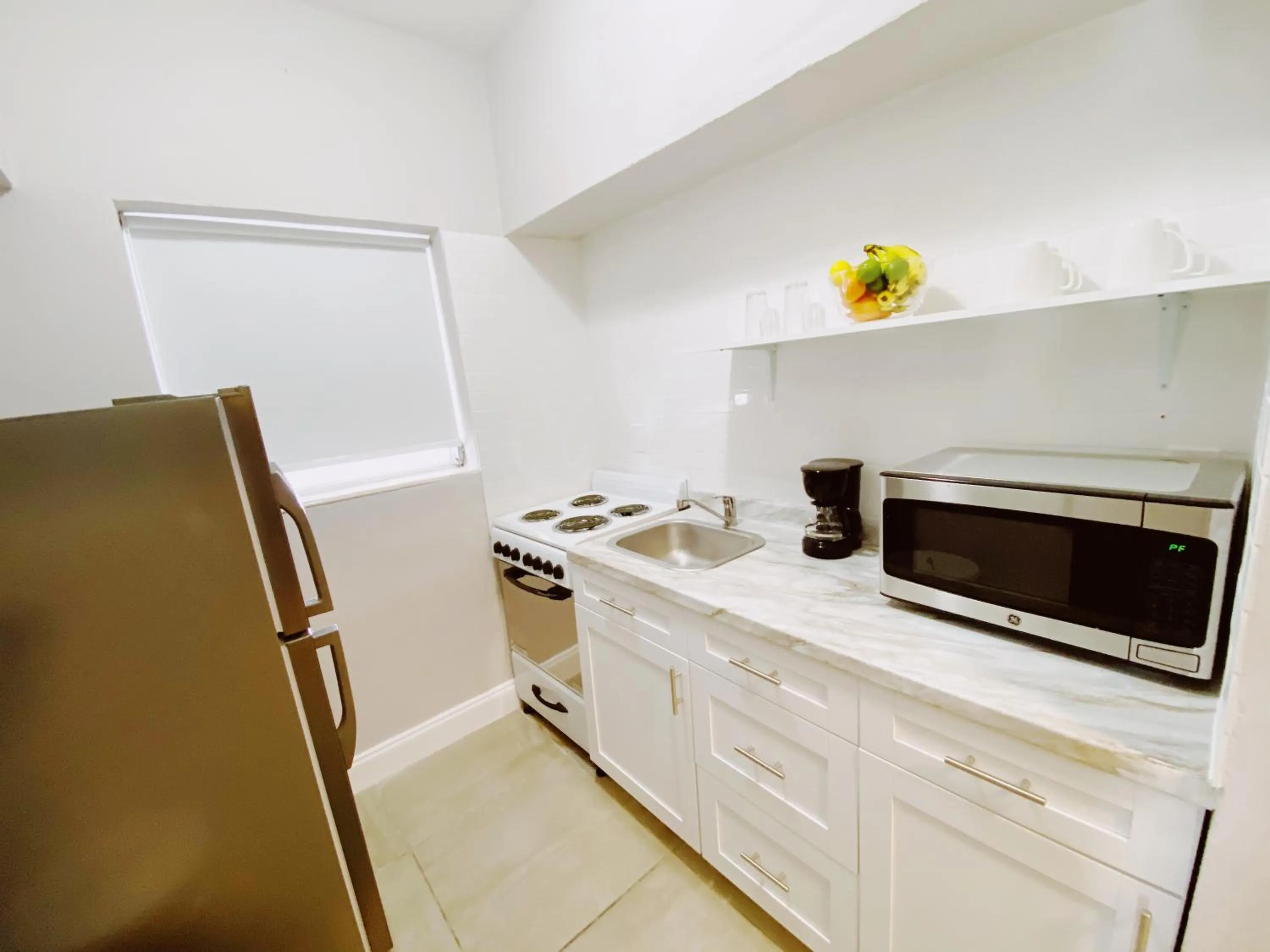 Kitchen or kitchenette in Miami International by Lowkl