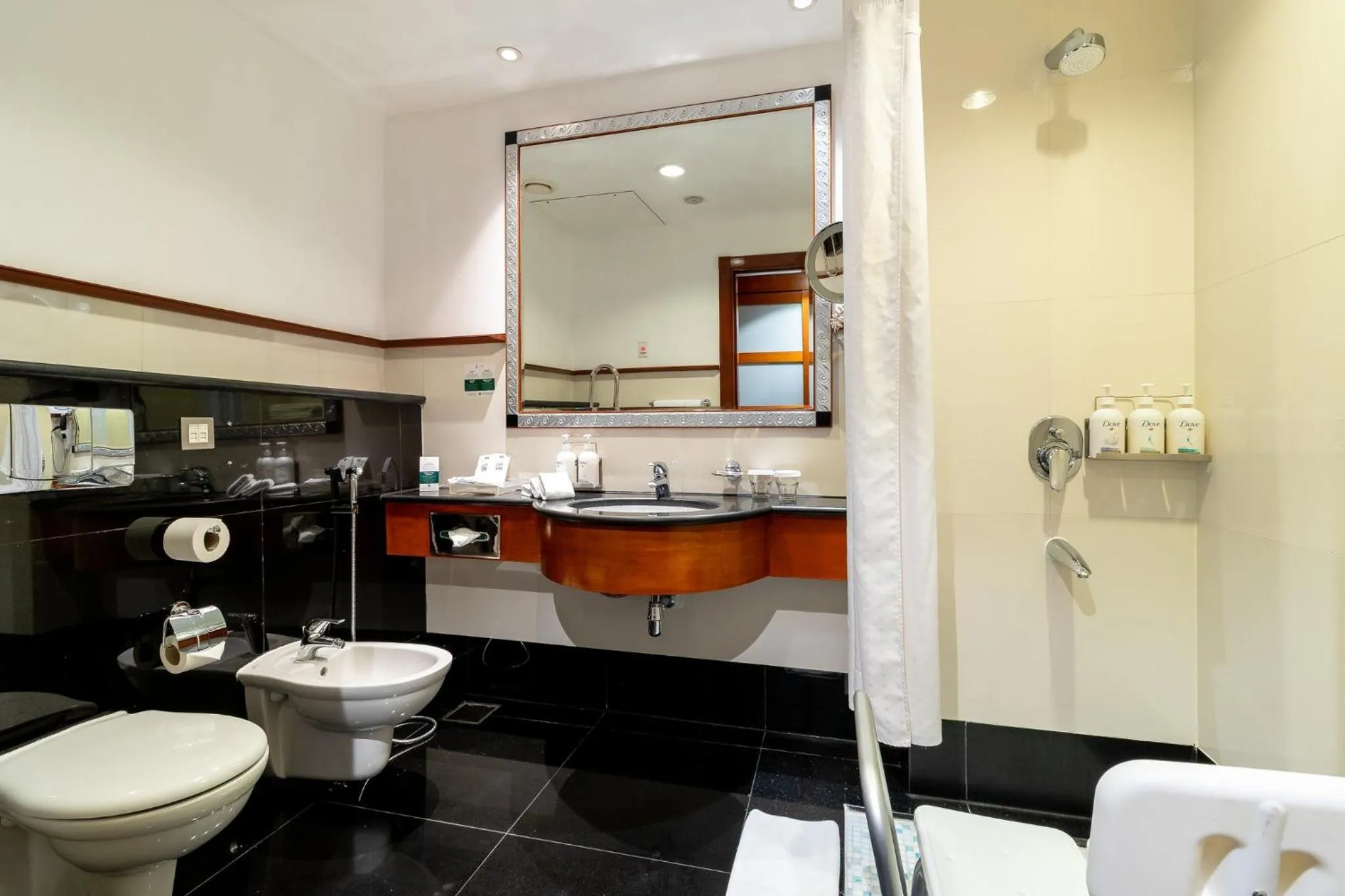Bathroom in Holiday Inn Kuwait by IHG