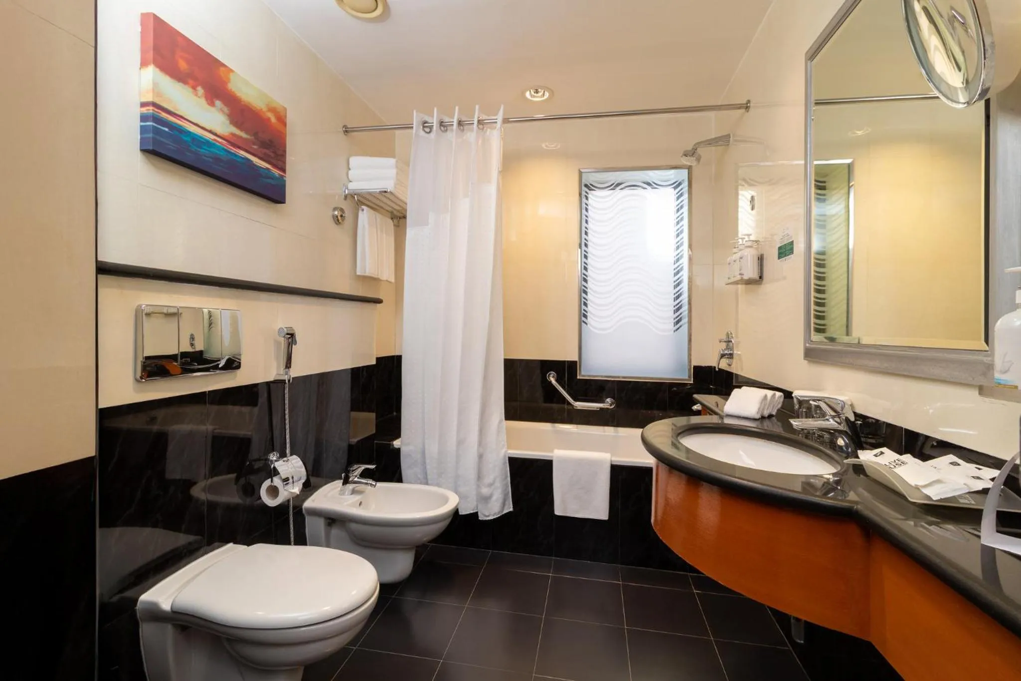 Bathroom in Holiday Inn Kuwait by IHG