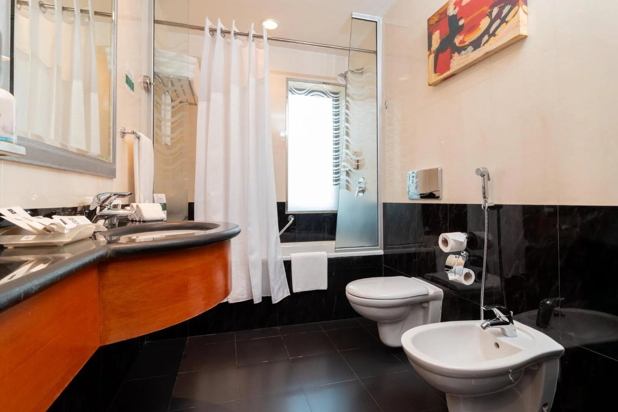 Bathroom in Holiday Inn Kuwait by IHG